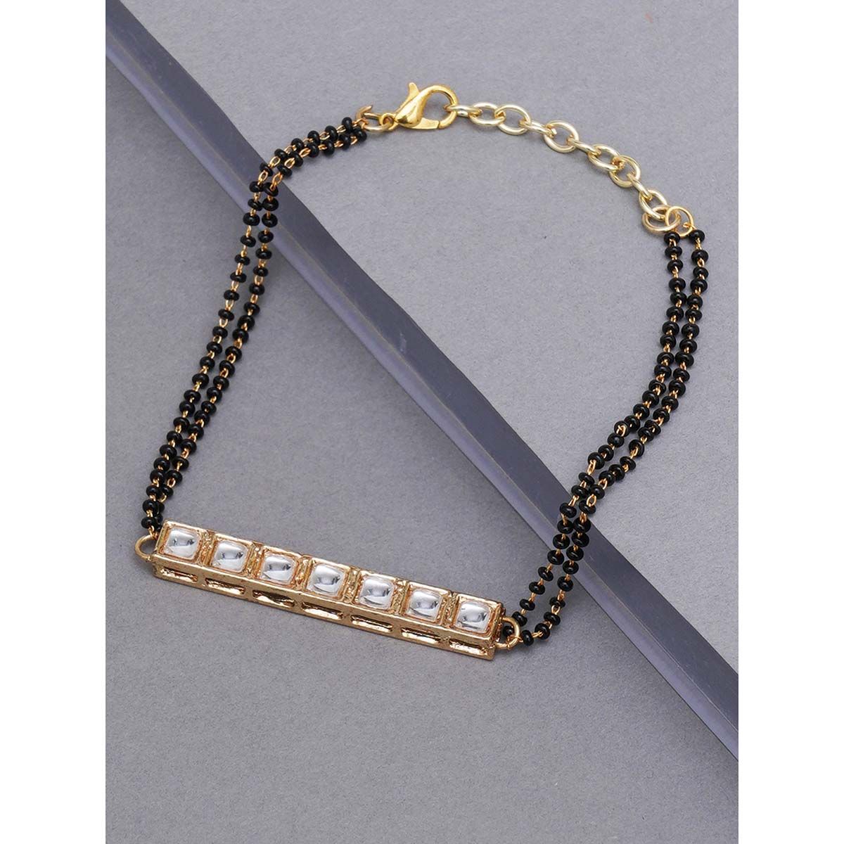 Buy Jewelopia Gold Plated Alphabet Gold Plated Cz Studded Bracelet With Black  Beads For Womens l Bracelets l Fashion Jewellery Online at Best Prices in  India  JioMart