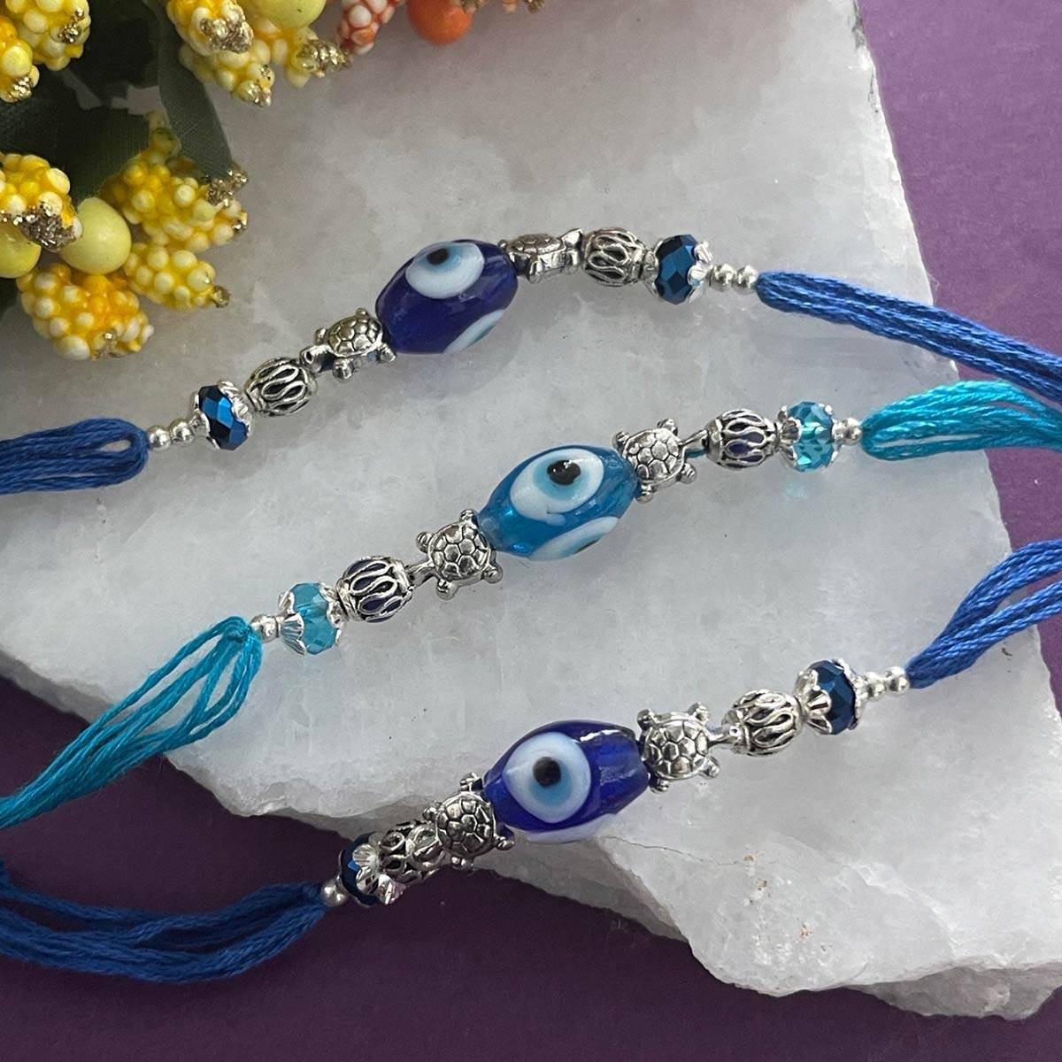 Digital Dress Room Designer Rakhi Navy Blue & Sky Blue Evil EyeTortoise Thread Rakhi (Pack of 3)