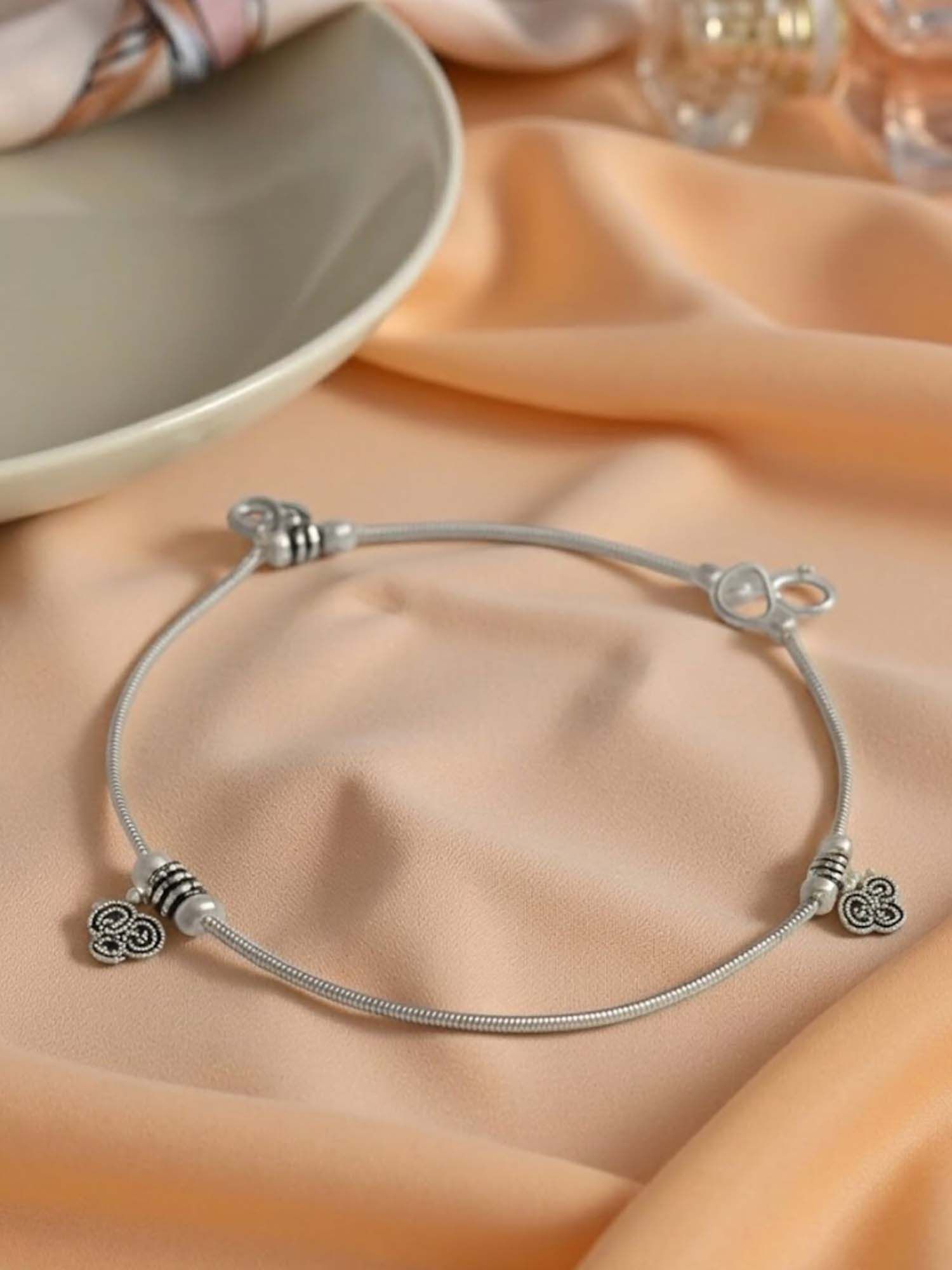 Buy Accessher Women Oxidised Silver Floral Ghungroo Anklets Online
