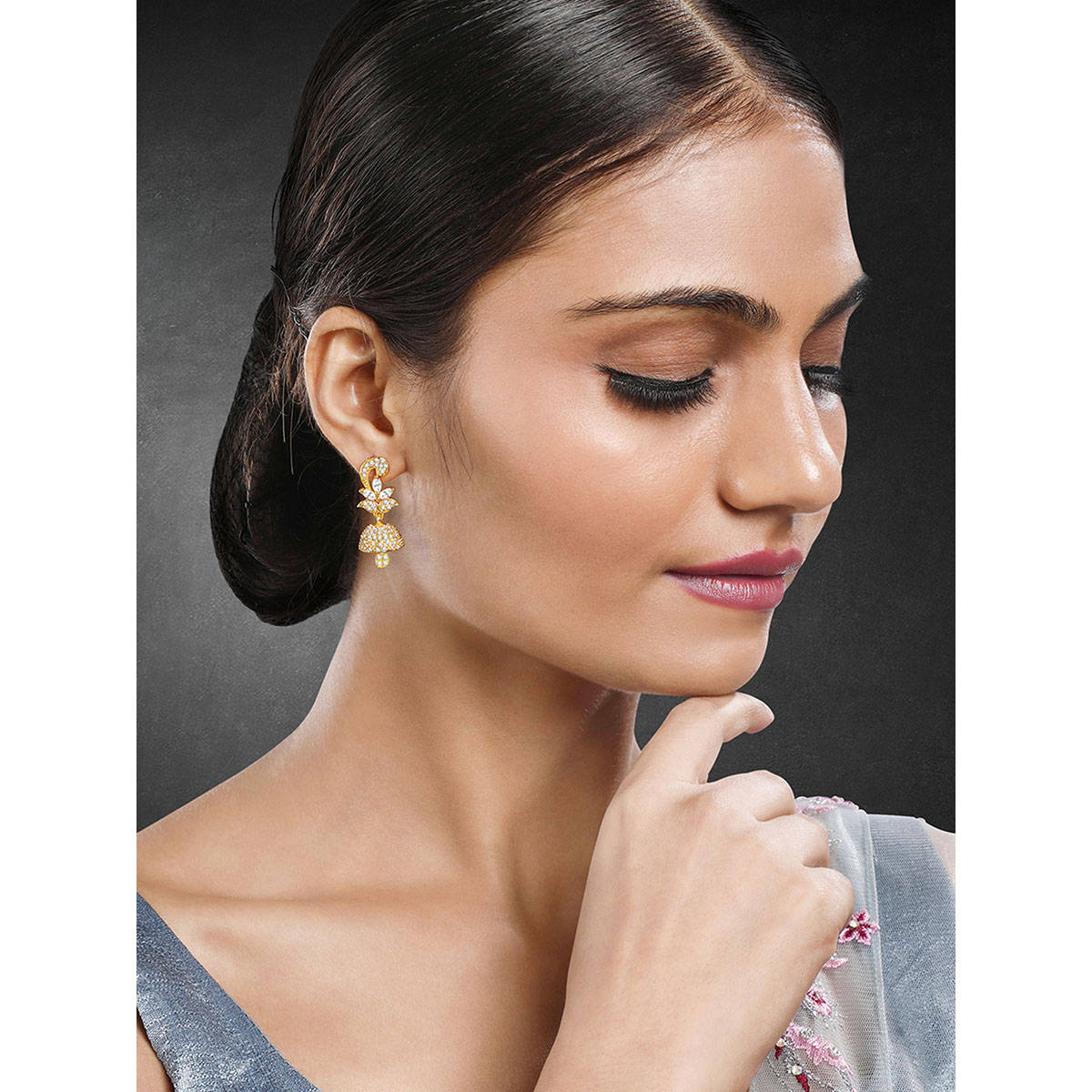 Peora Gold Plated White Synthetic Stone Studded Floral Jhumki Earrings