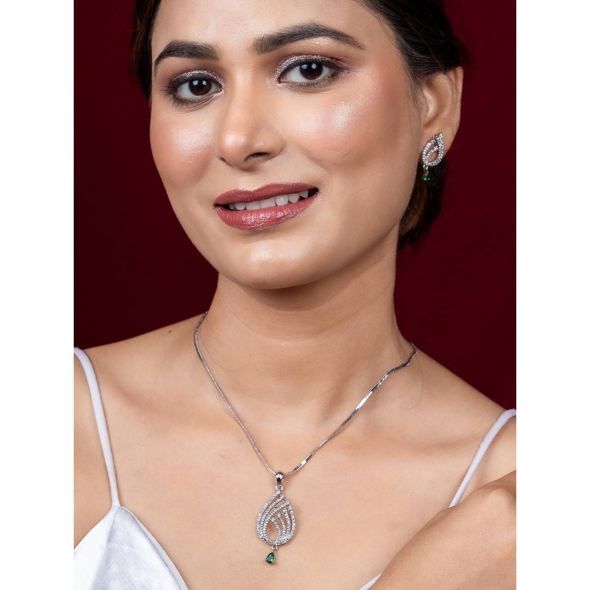 Niscka Timeless Silver Plated Emerald & American Diamond Pendant & Earrings