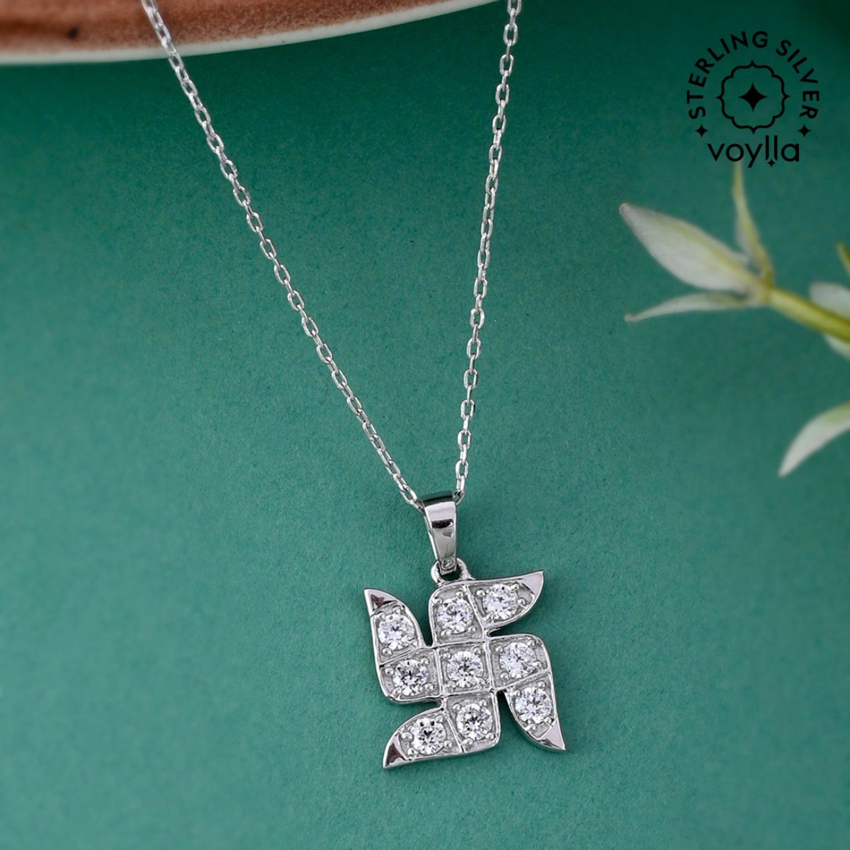 Swastik pendant silver deals
