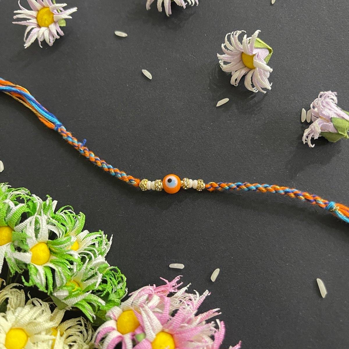 Digital Dress Room Beautiful Designer Rakhi Orange Evil Eye Charm Moti Thread Rakhi