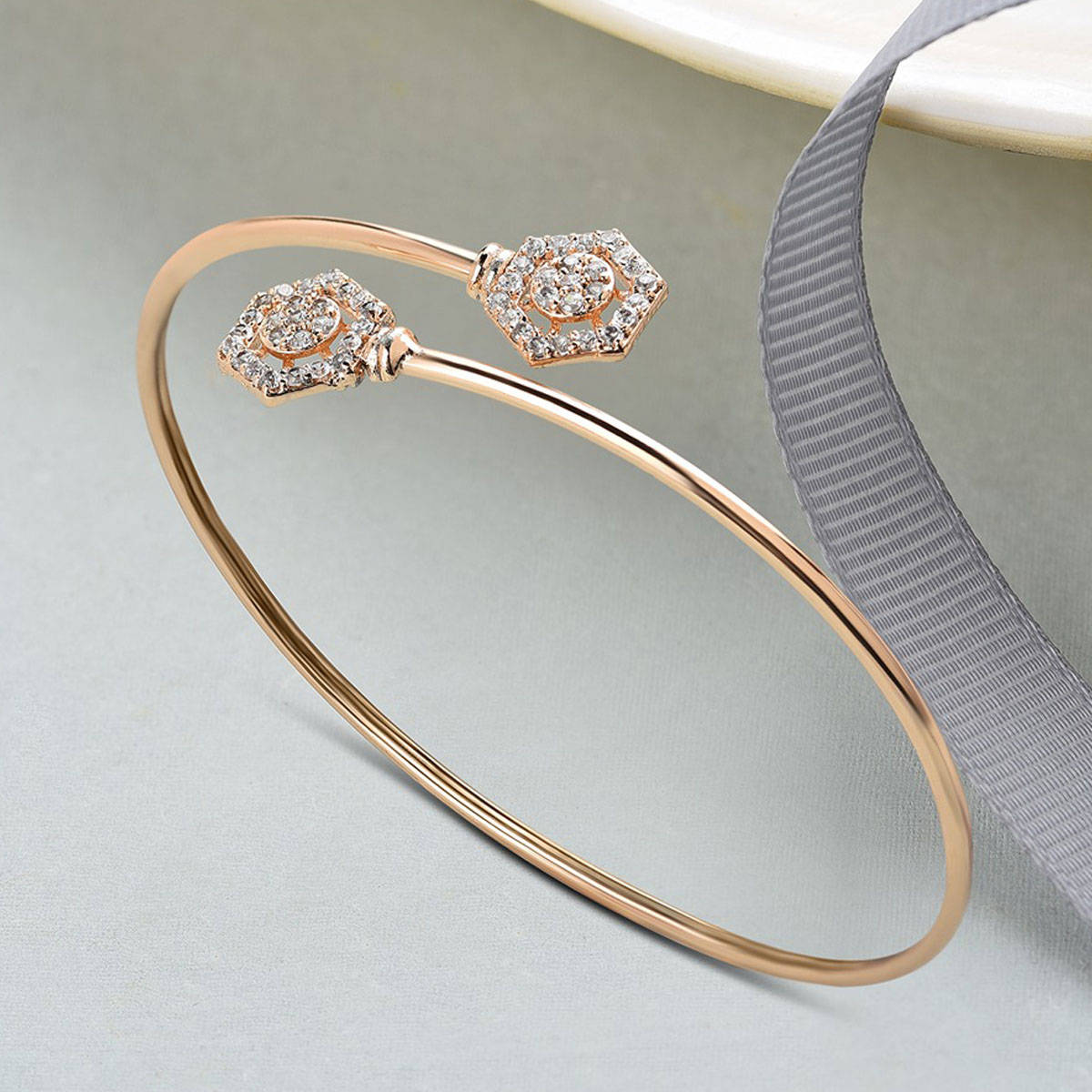 Zaveri Pearls Rose Gold Contemporary Cubic Zirconia Bangle Style Brass Kada-ZPFK10388