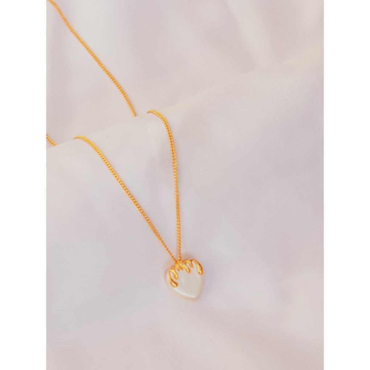 The Melting Heart Necklace in Silver | Andre Jewelry