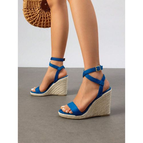 IRUSSH Vibrant Blue Suede Crisscross Wedges (EURO 35)
