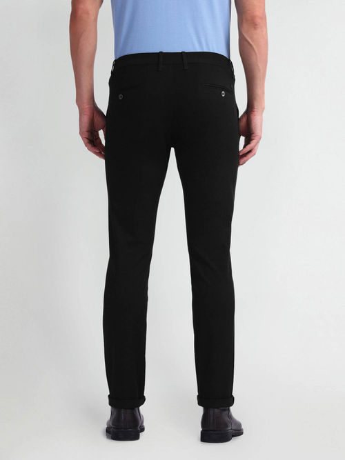 Buy Arrow Sports Mens Black Solid Autoflex Trousers Online