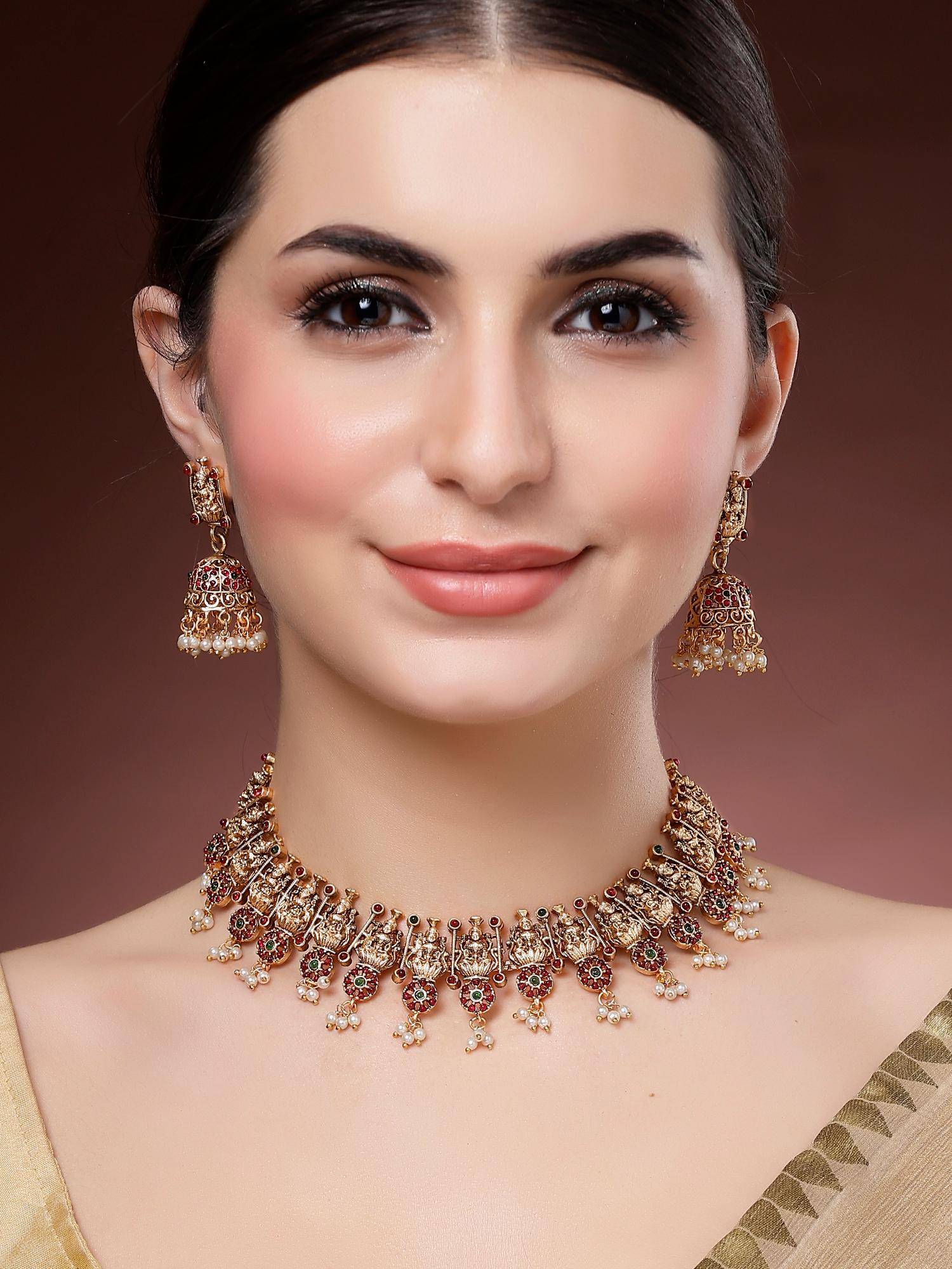 Karatcart Red and Green Stone Laxmi Mata and Floral Temple Necklace With Earrings
