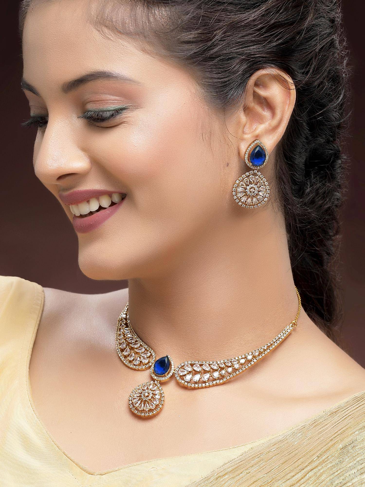 Karatcart Traditional Gold-Plated Blue American Diamond Necklace With Earrings