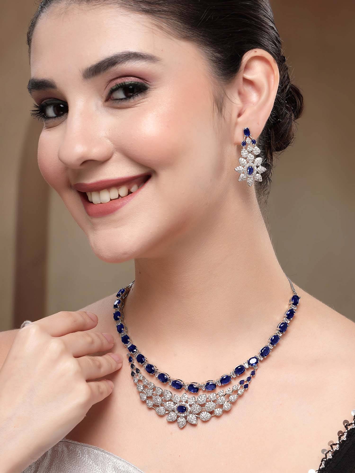 Karatcart Luxurious Blue American Diamond Silver-Plated Floral Necklace With Earrings