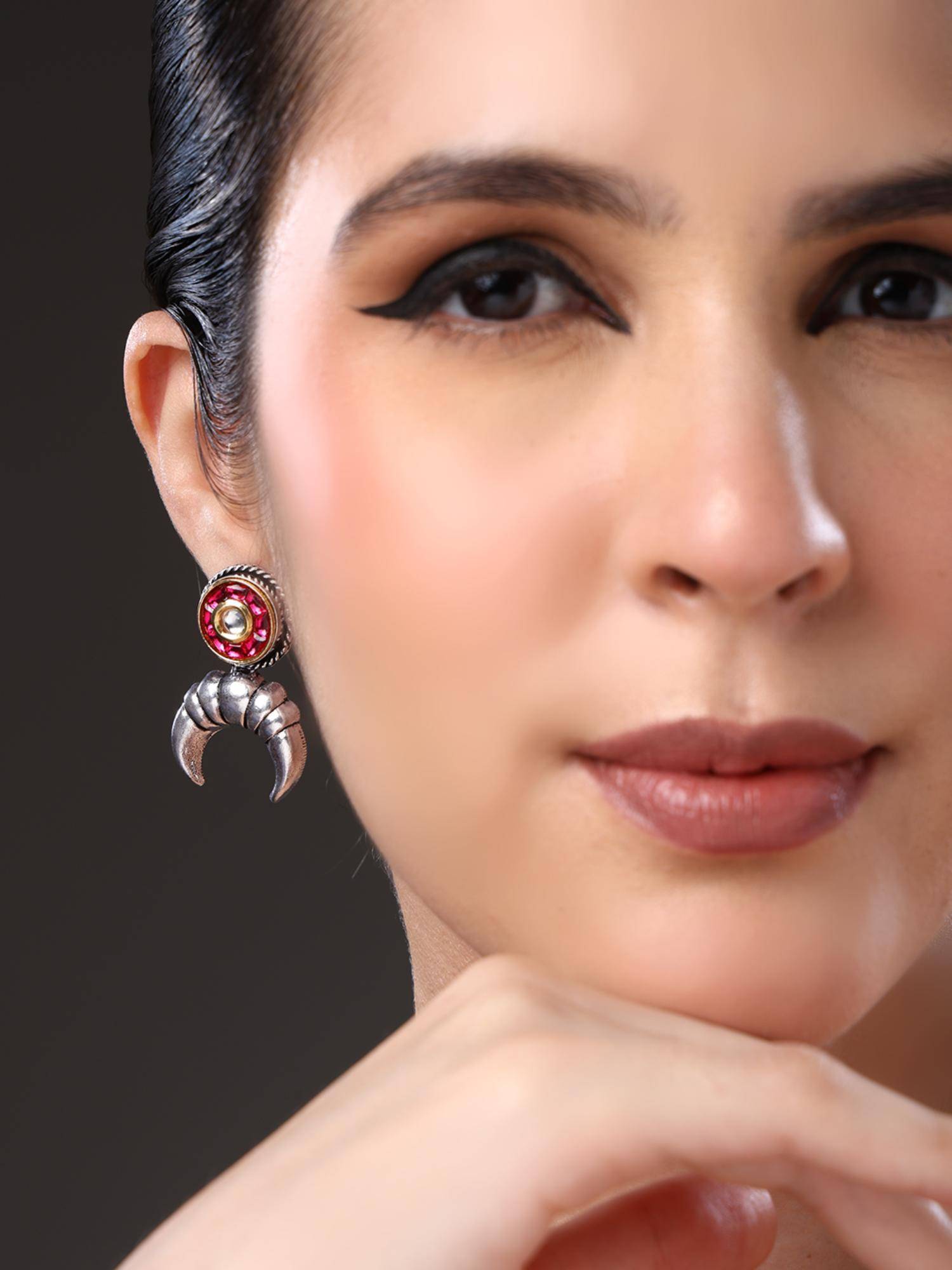 VENI Pink Silver-Plated Artificial Stones Studded Oxidised Crescent Shaped Drop Earrings