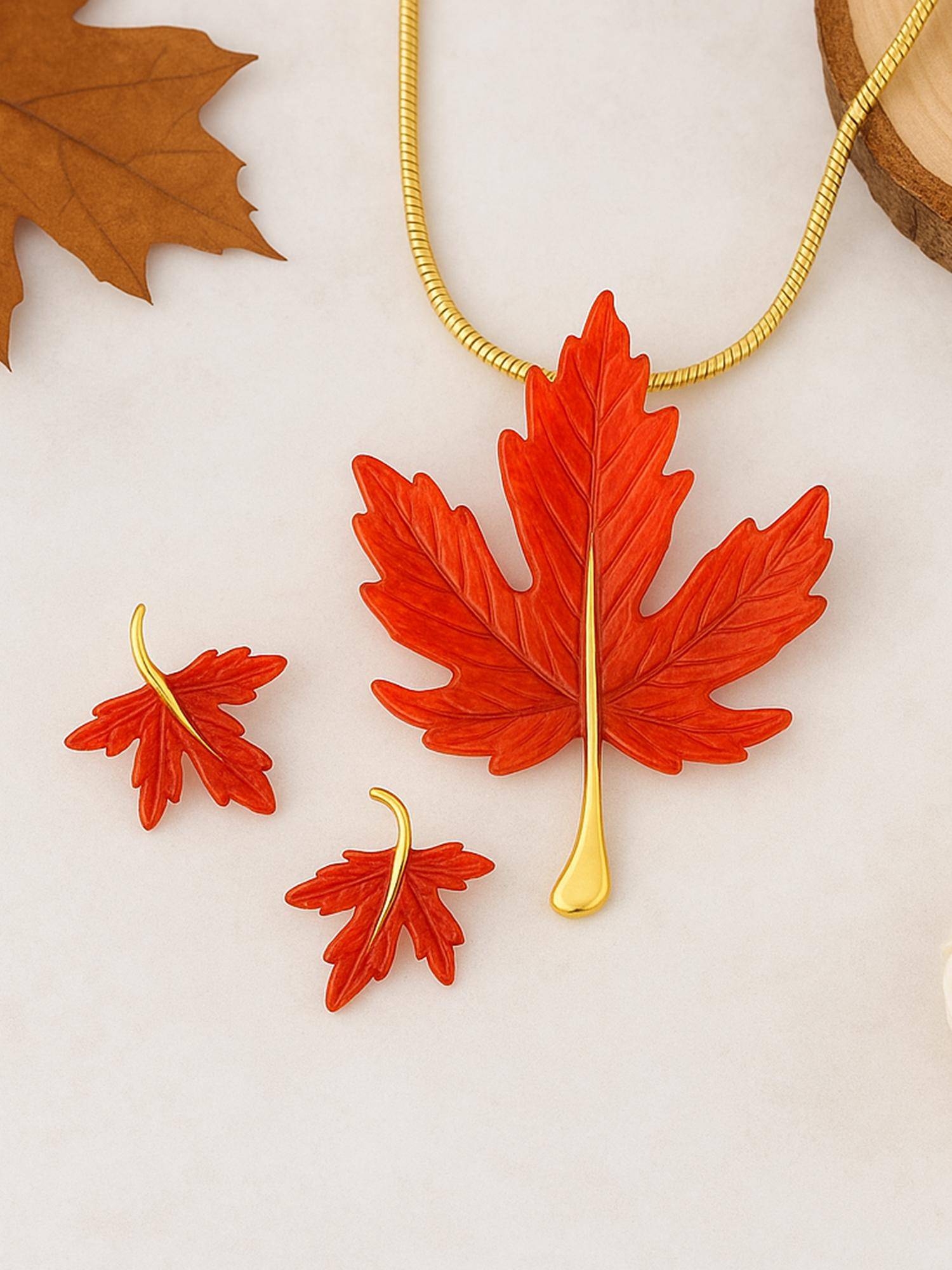 Estele Gold Plated Leaf Designer Pendant Set with Red Enamel for Women