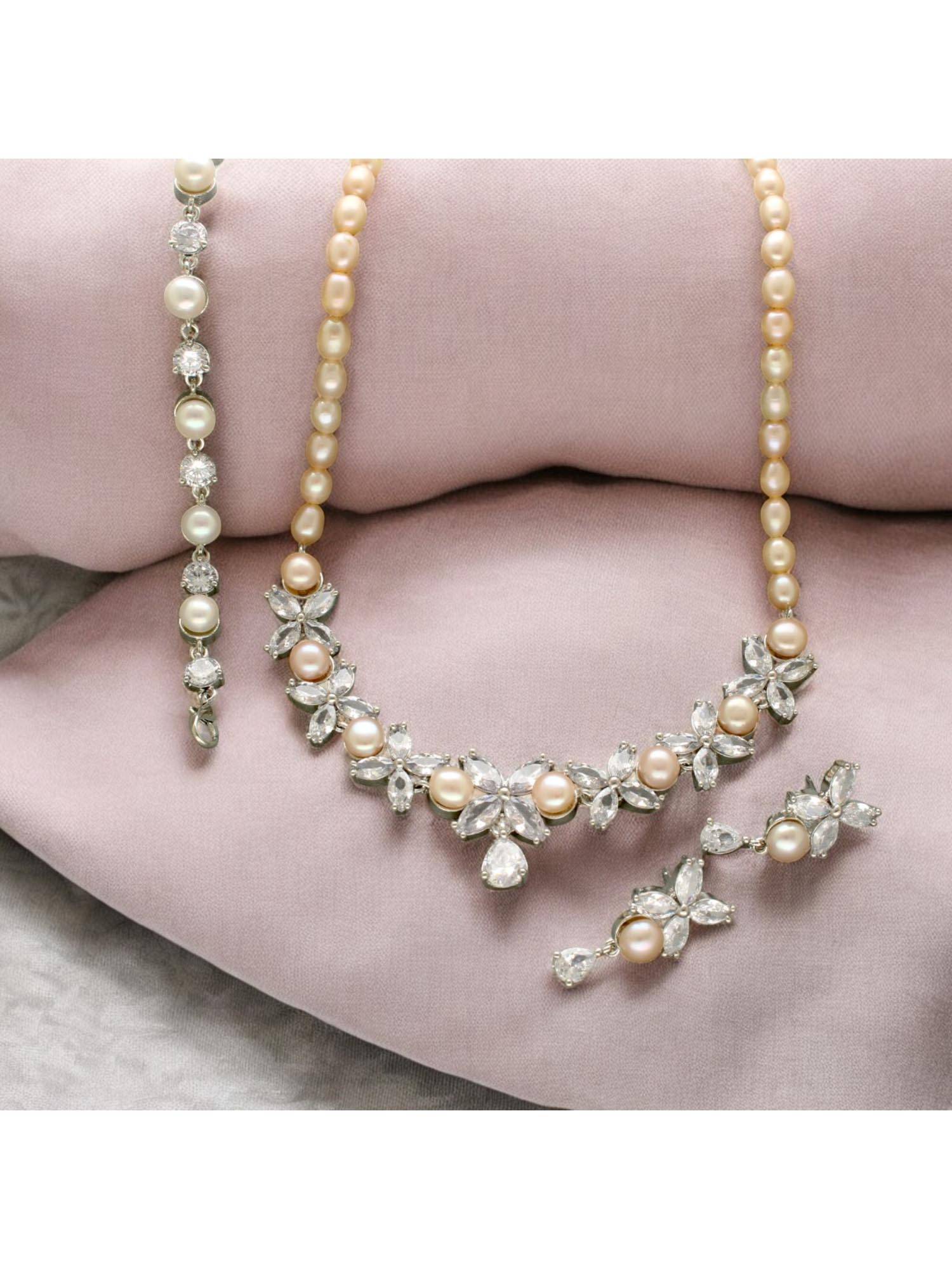 Sri Jagdamba Pearls Crimson Crest Ivory Pearl and Stone Jewellery Set