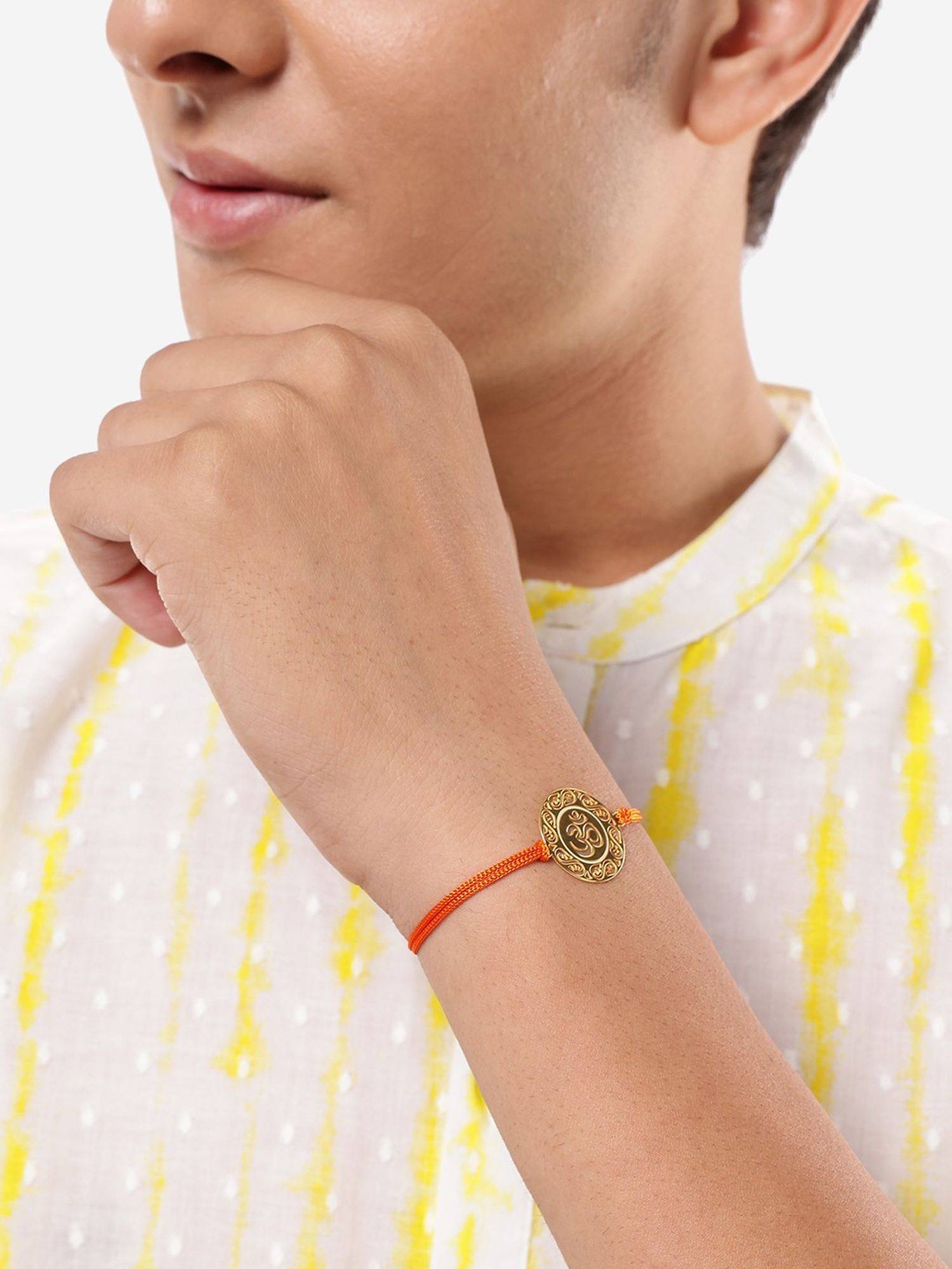 Carlton London 18Kt Gold Plated Om Rakhi