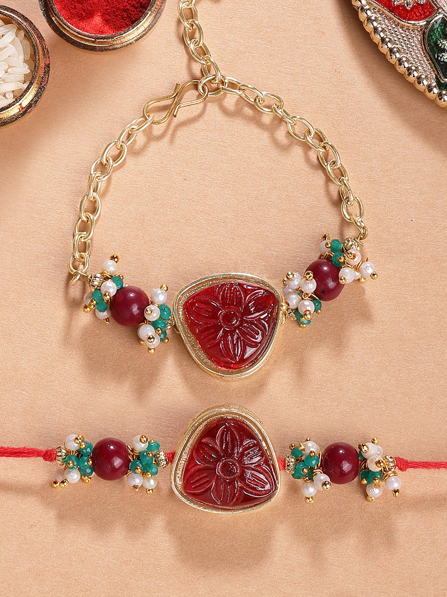 Karatcart Gold Plated Red Carved Stone Bhaiya Bhabhi Rakhi with Roli & Chawal (Pack of 2)