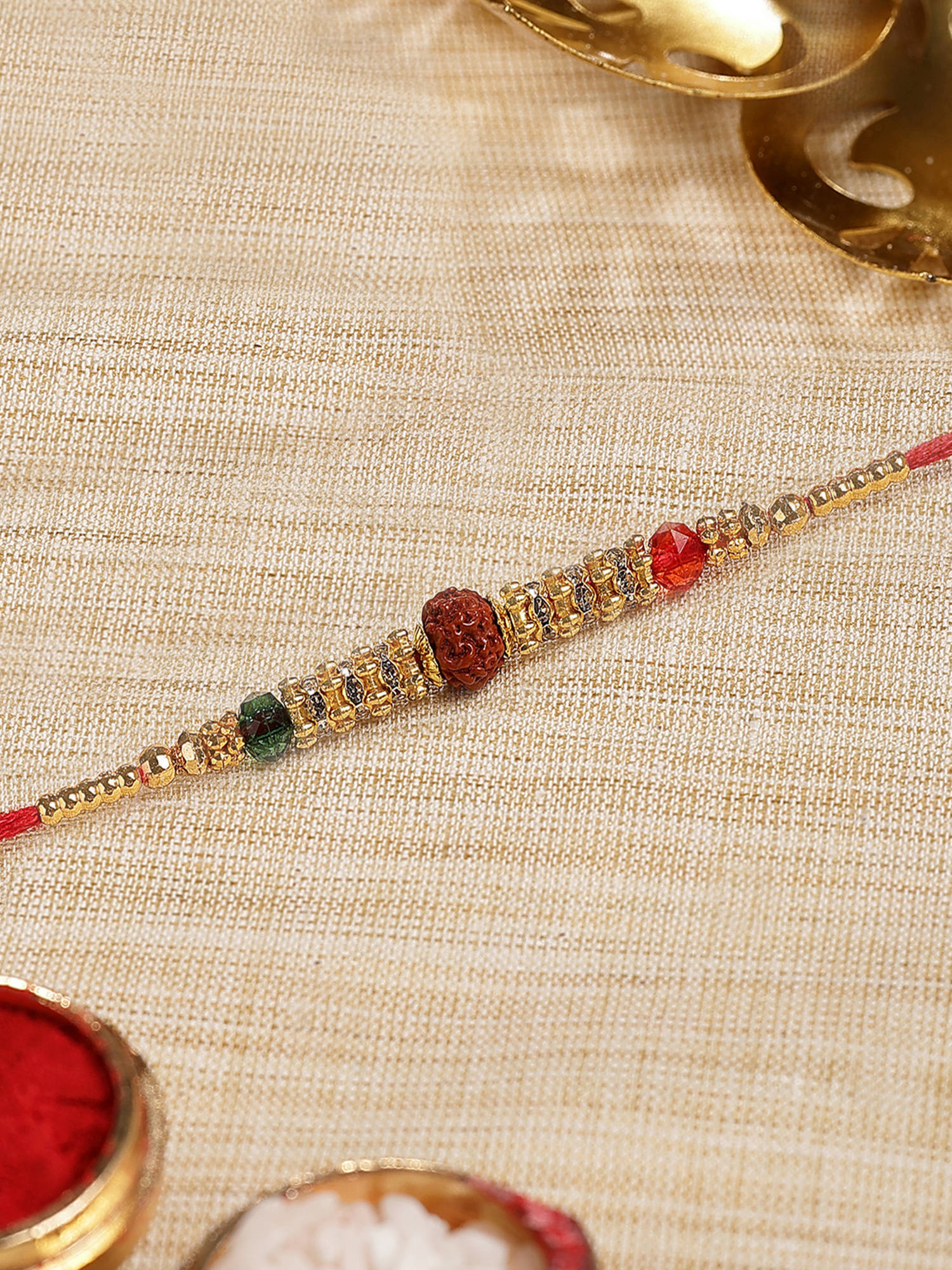 Karatcart Multi-Color Gold Plated Rudraksha Bhaiya Kundan Rakhi with Roli & Chawal
