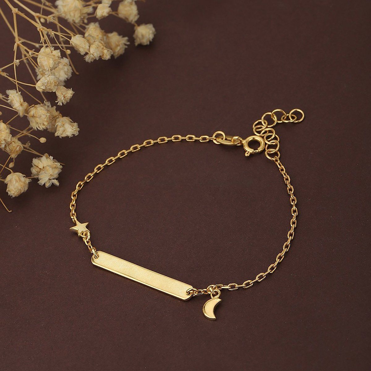 Buy Carlton London Women GoldPlated Brass Charm Bracelet Online