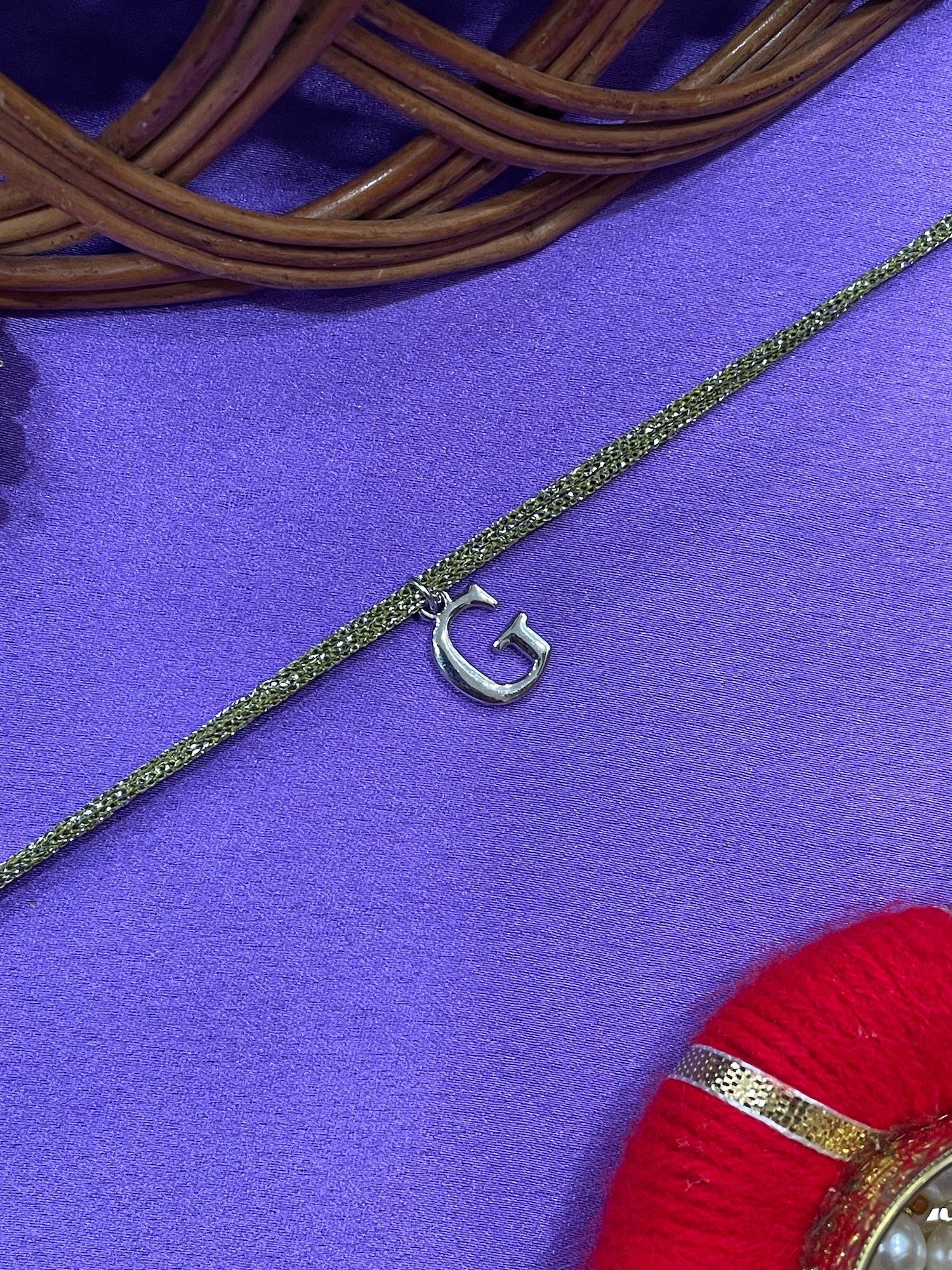 Digital Dress Room G Letter Silver Plated Rakhi