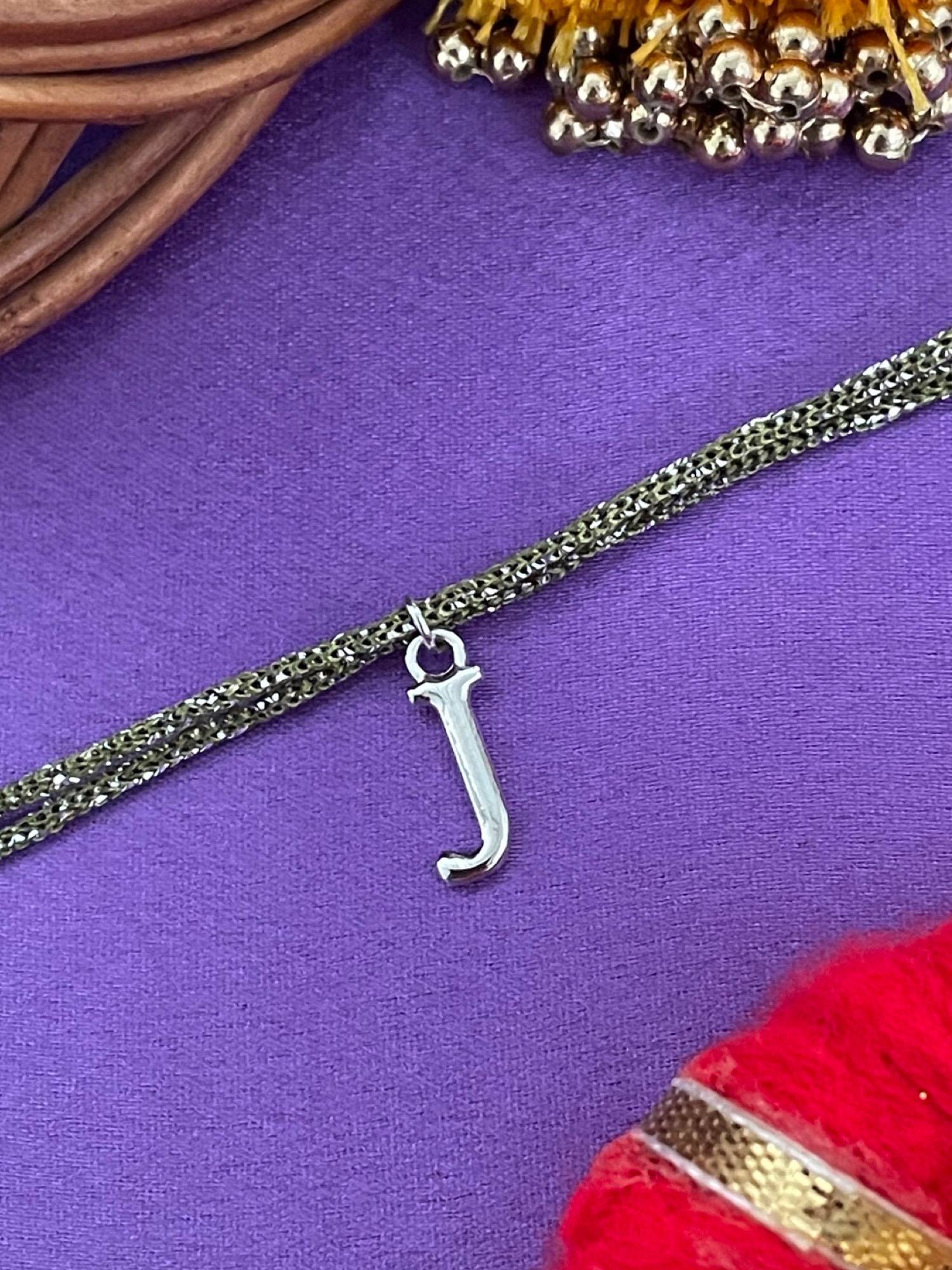 Digital Dress Room J Letter Silver Plated Rakhi