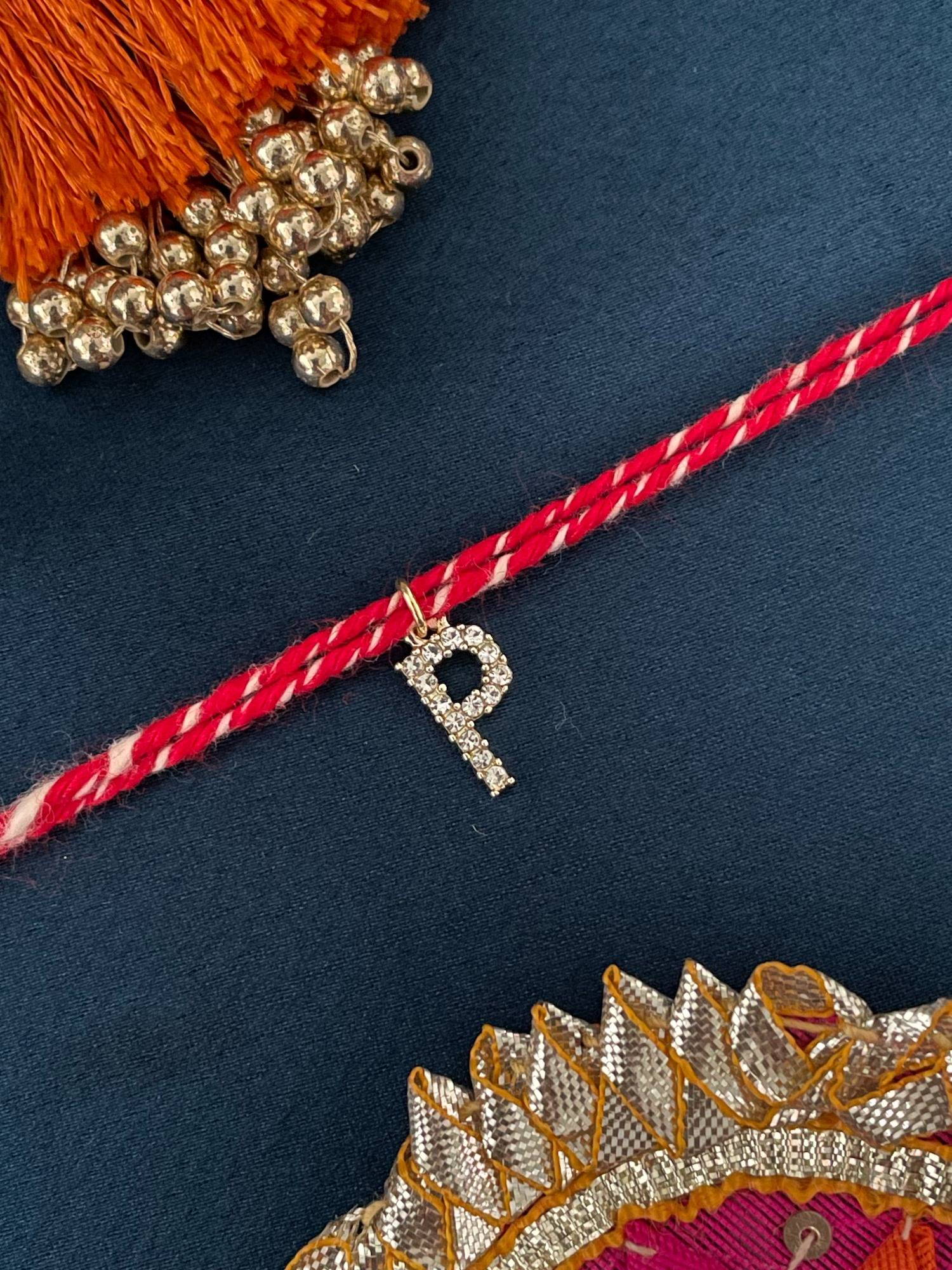 Digital Dress Room P Letter Gold Plated Ad Stone Initial Charm Rakhi