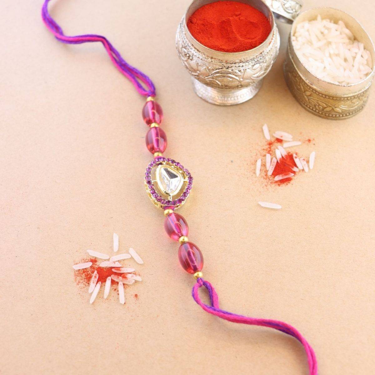 I Jewels Purple Pearl & Kundan Designer Bhaiya Rakhi with Roli Chawal