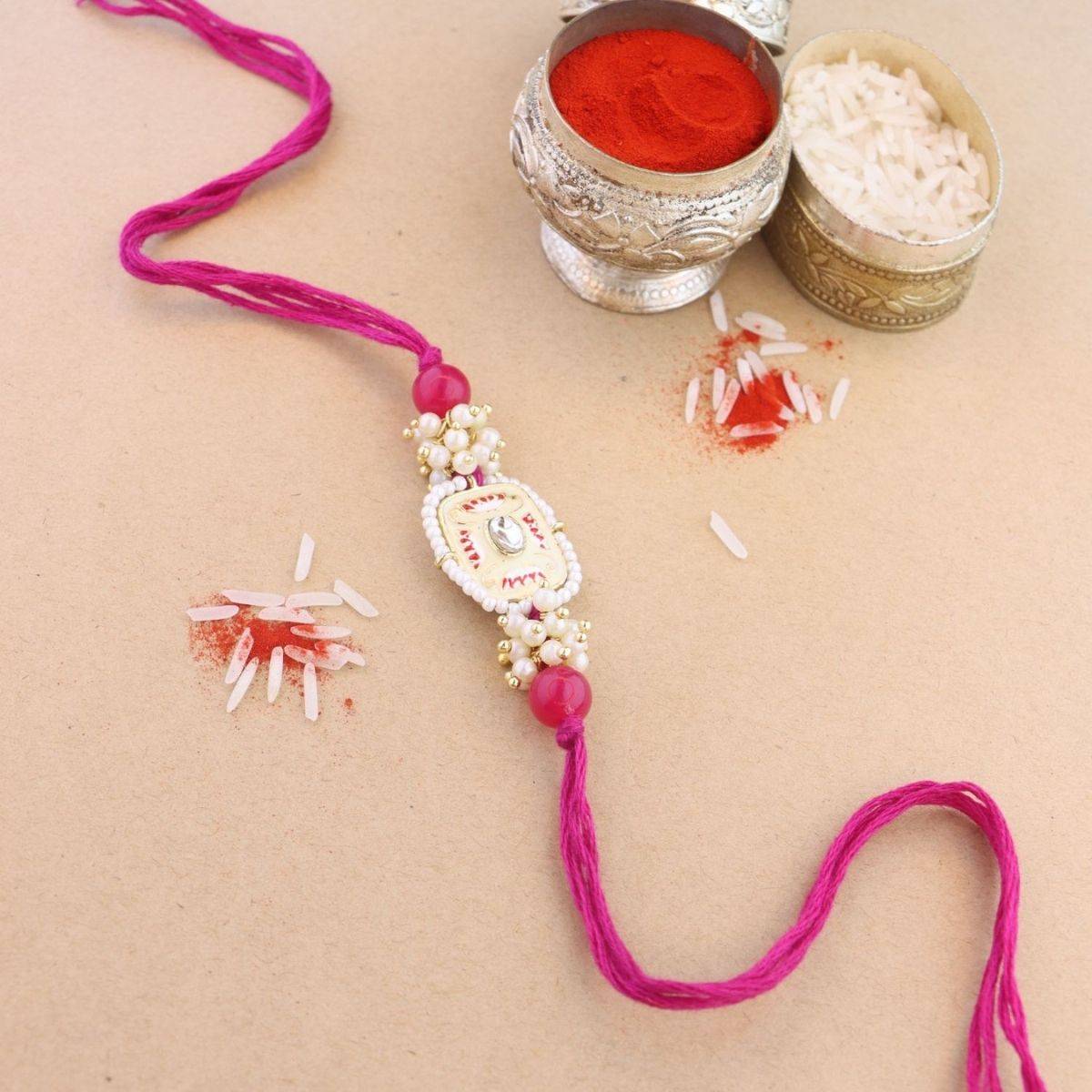 I Jewels Pink Pearl & Minakari Designer Bhaiya Rakhi with Roli Chawal