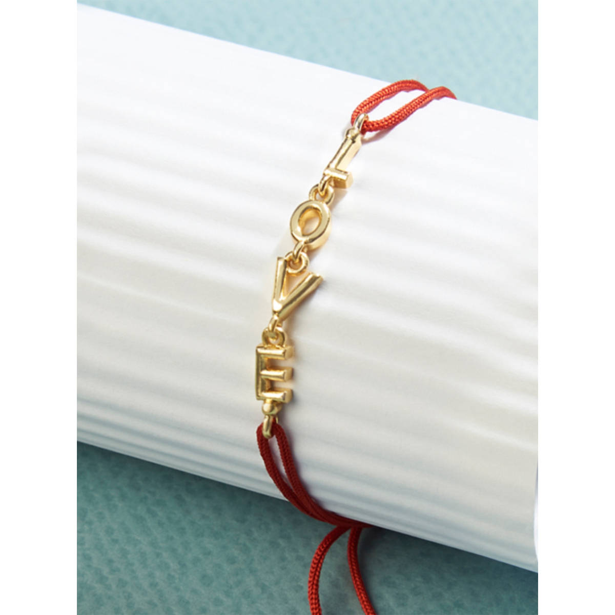 MINUTIAE Toned Designed Inter Locked Bracelet Rakhi