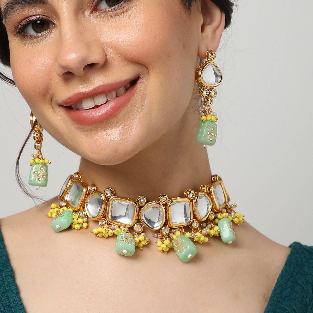 SOHI Gold Plated Kundan Beads Necklace and Earring Set