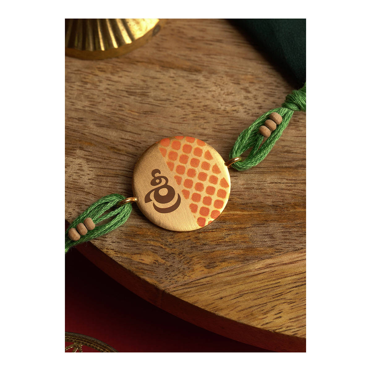 Buy Suhani Pittie 22K Gold Plated Hand Painted Round Rakhi With Green ...