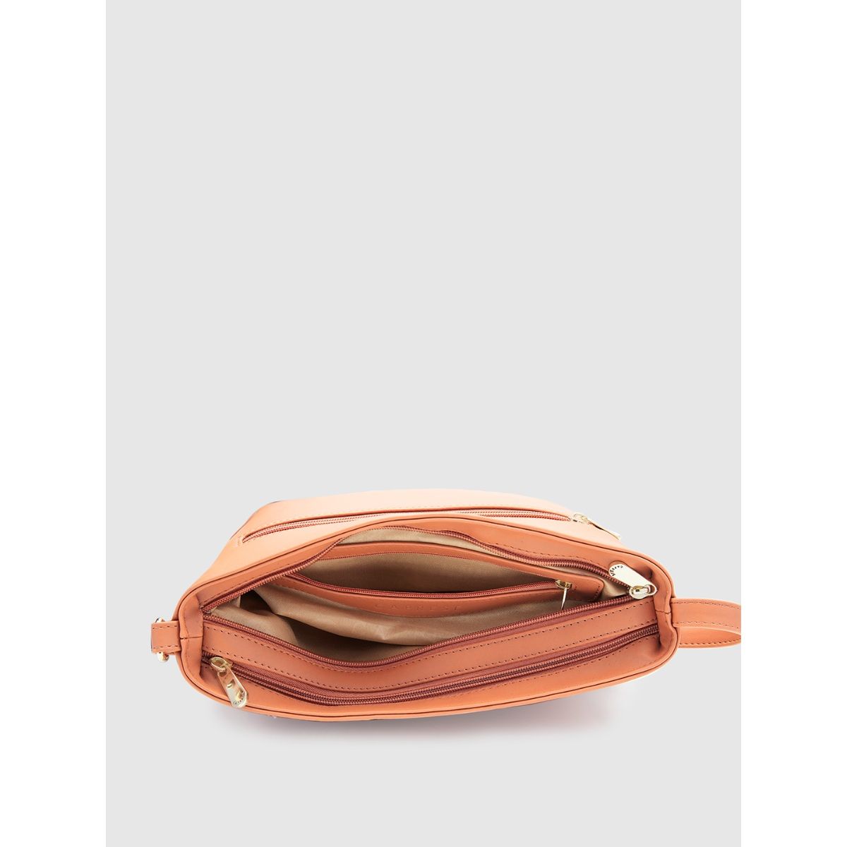 Caprese orange sling bag sale