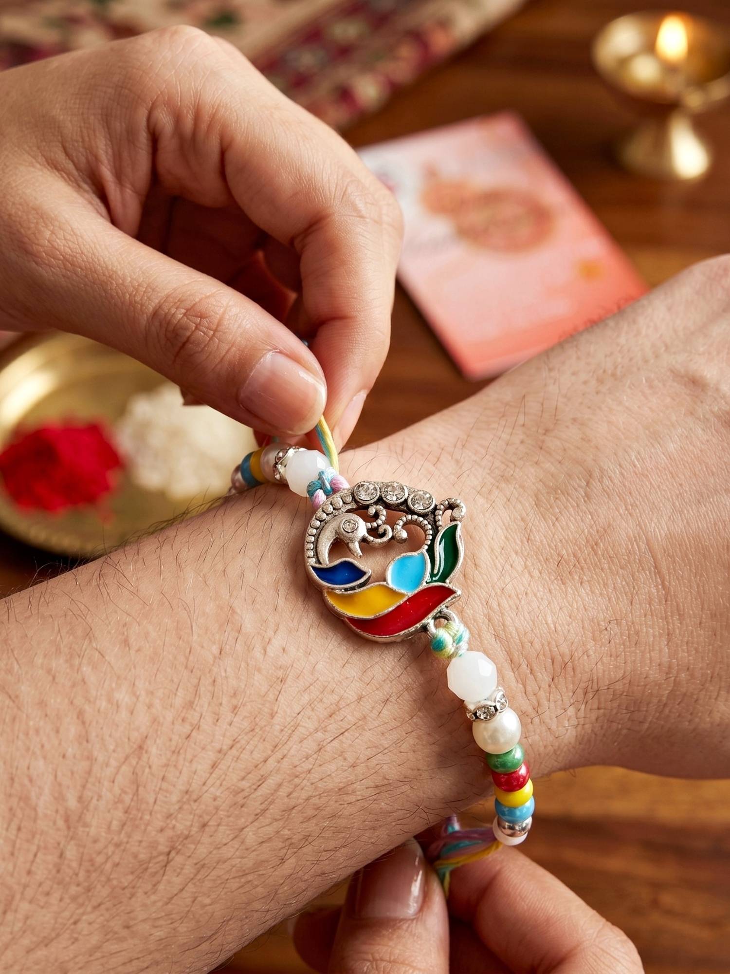 LUCKY JEWELLERY Meenakari Peacock Beaded Rakhi For Brother Roli Chawal and Card