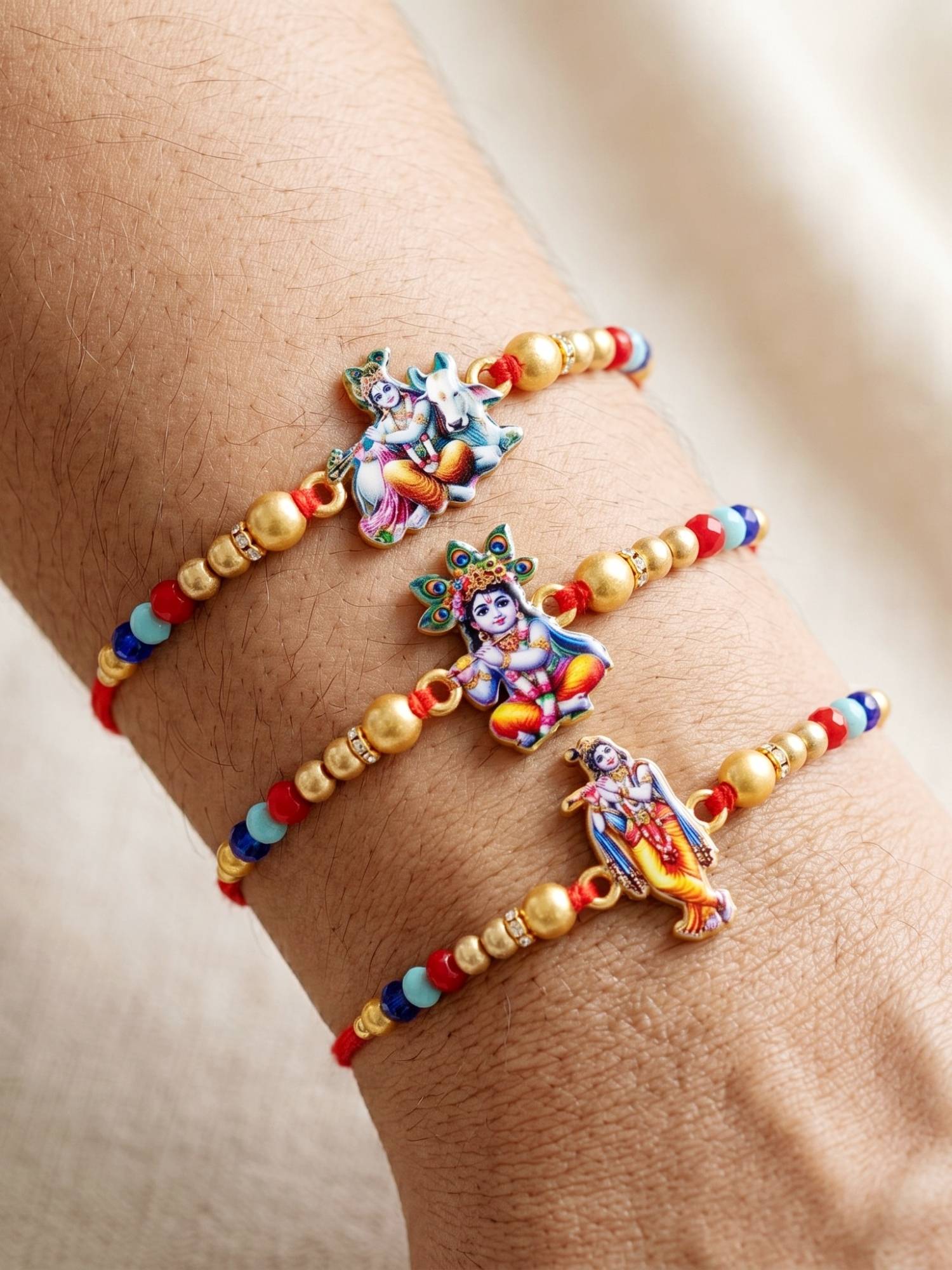 LUCKY JEWELLERY Red Thread with Golden and Coloured Beads Rakhi for Bhai (Pack of 3)
