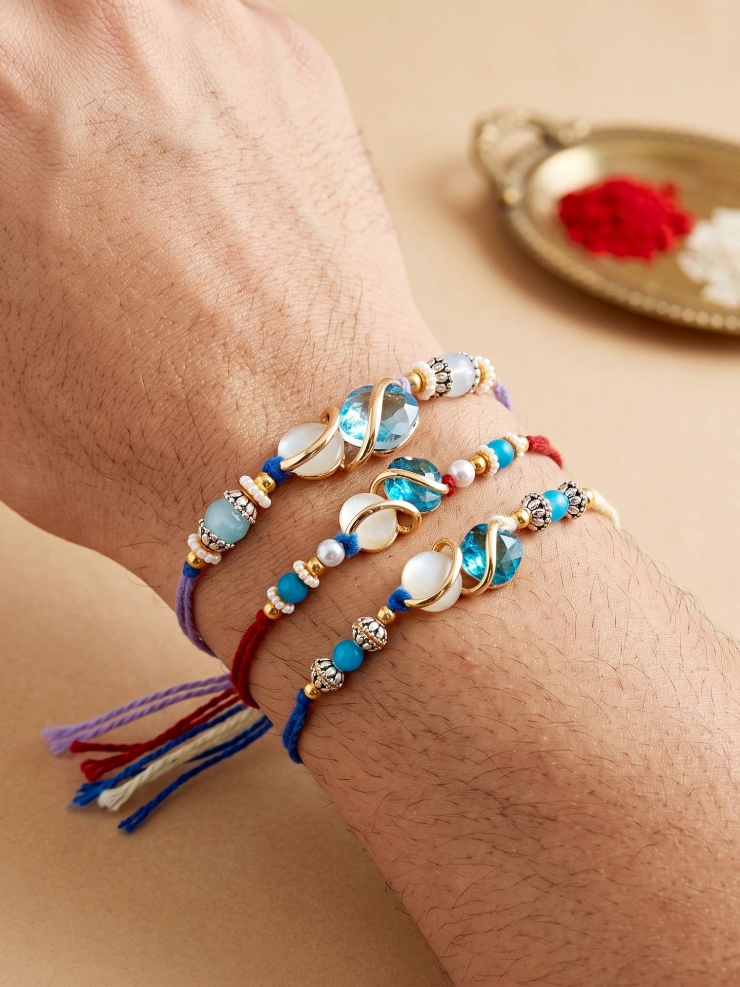 LUCKY JEWELLERY Designer Rakhi Blue Crystal Cream Stone with Roli Chawal (Pack of 3)