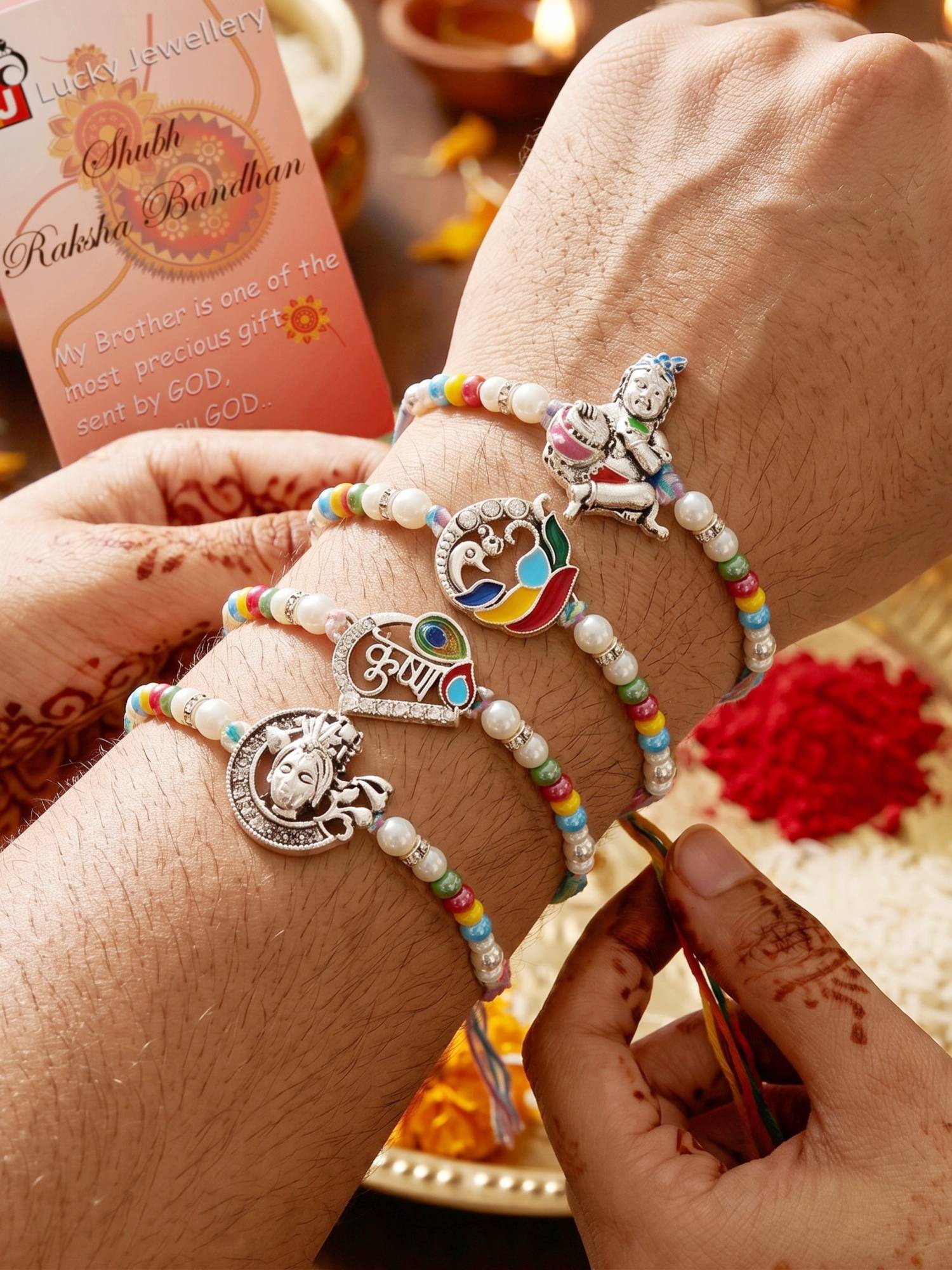 LUCKY JEWELLERY Silver-Toned Bal Krishna and Peacock Beaded Rakhi Combo for Brother (Pack of 4)