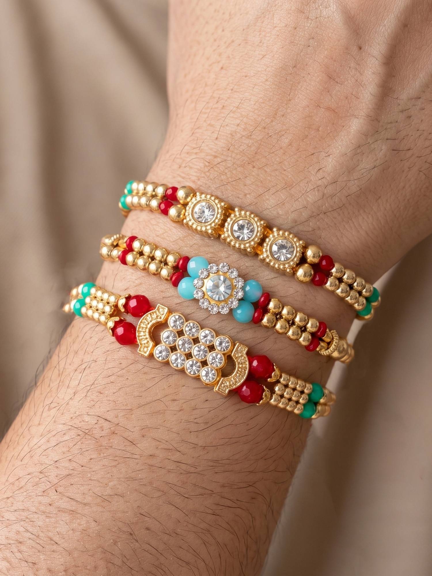 LUCKY JEWELLERY Rakhi with Small Crystal Centrepieces, Gold-Tone and Coloured Beads (Pack of 3)