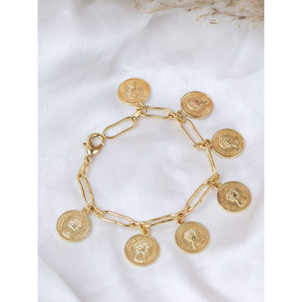 Sold at Auction: A gold coin bracelet