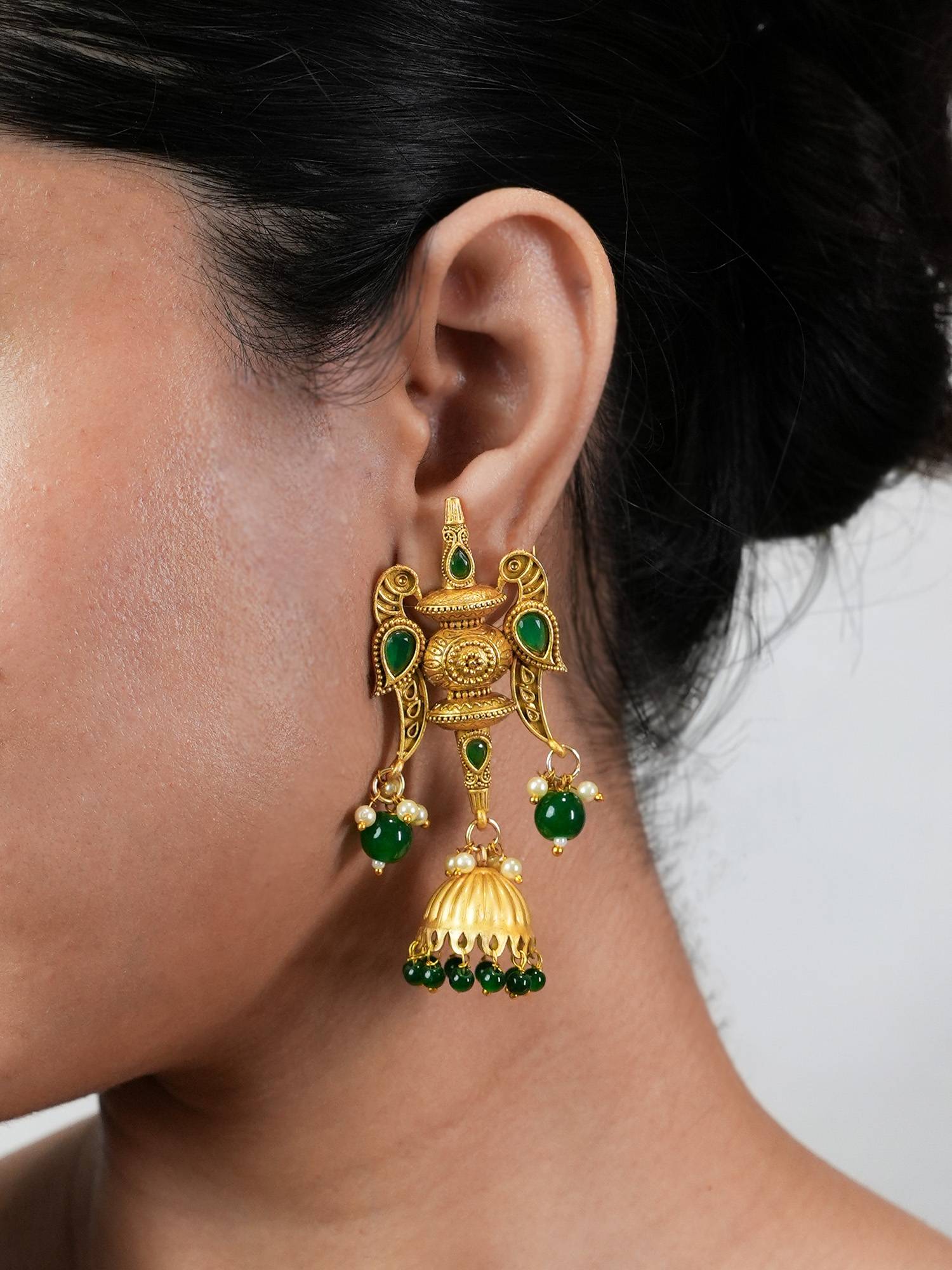 BeAbhika Handcrafted Green Bead Jhumka Earrings with Carved Top and Fish Motifs