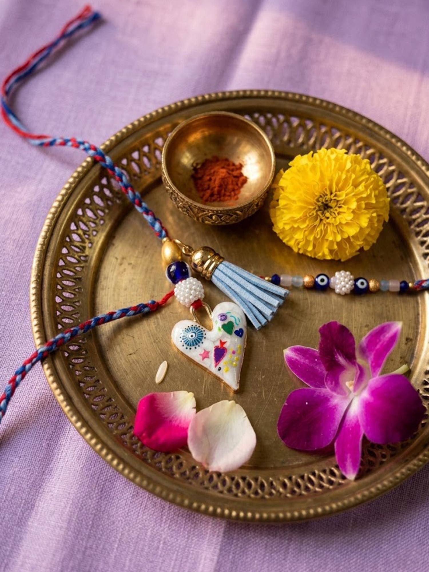NVR Chandan Evil Eye Beaded Heart Shape Bhaiya Bhabhi Rakhis