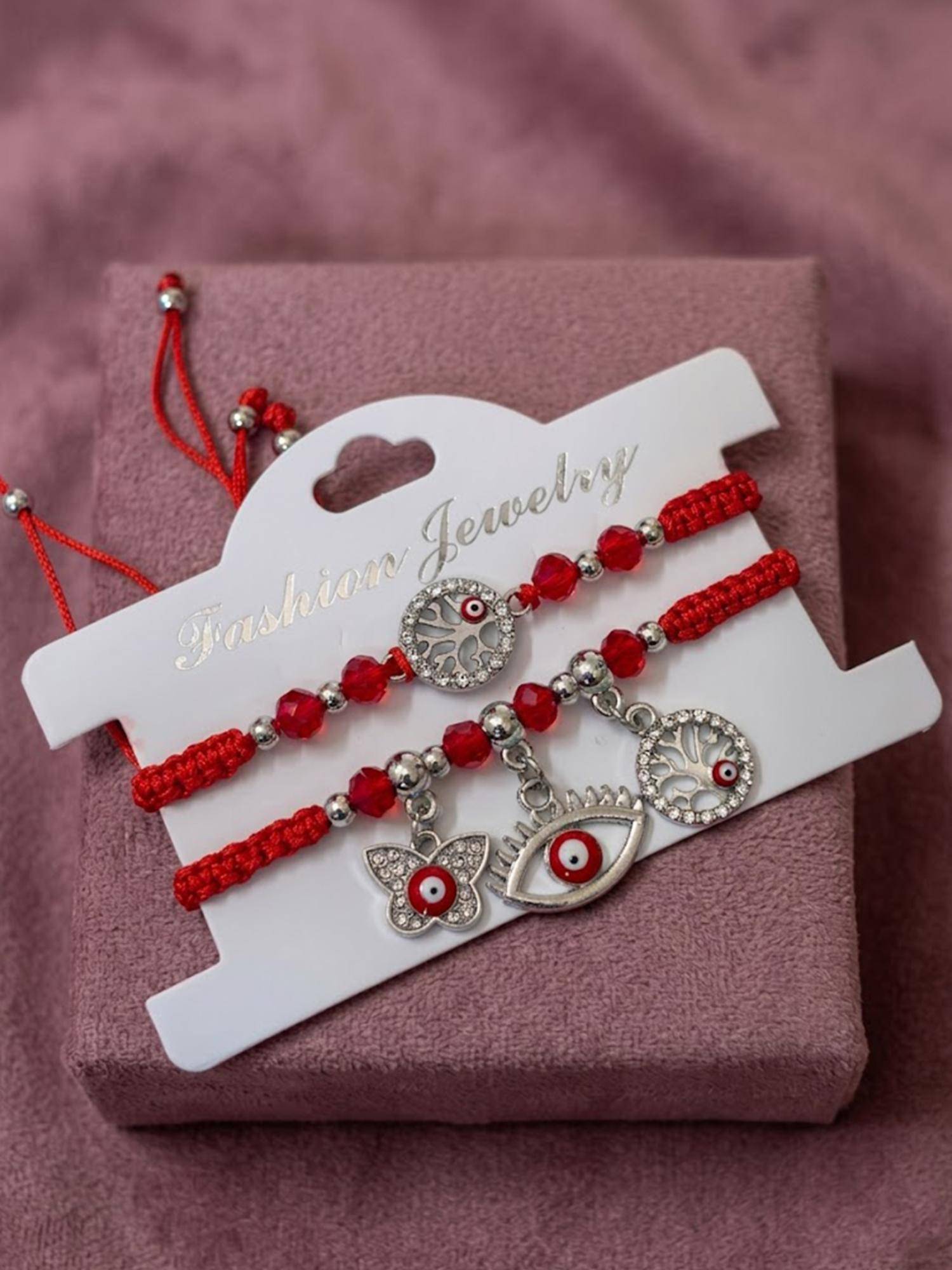 NVR Chandan Red Evil Eye Design Bhaiya Bhabhi Rakhis (Pack Of 2)
