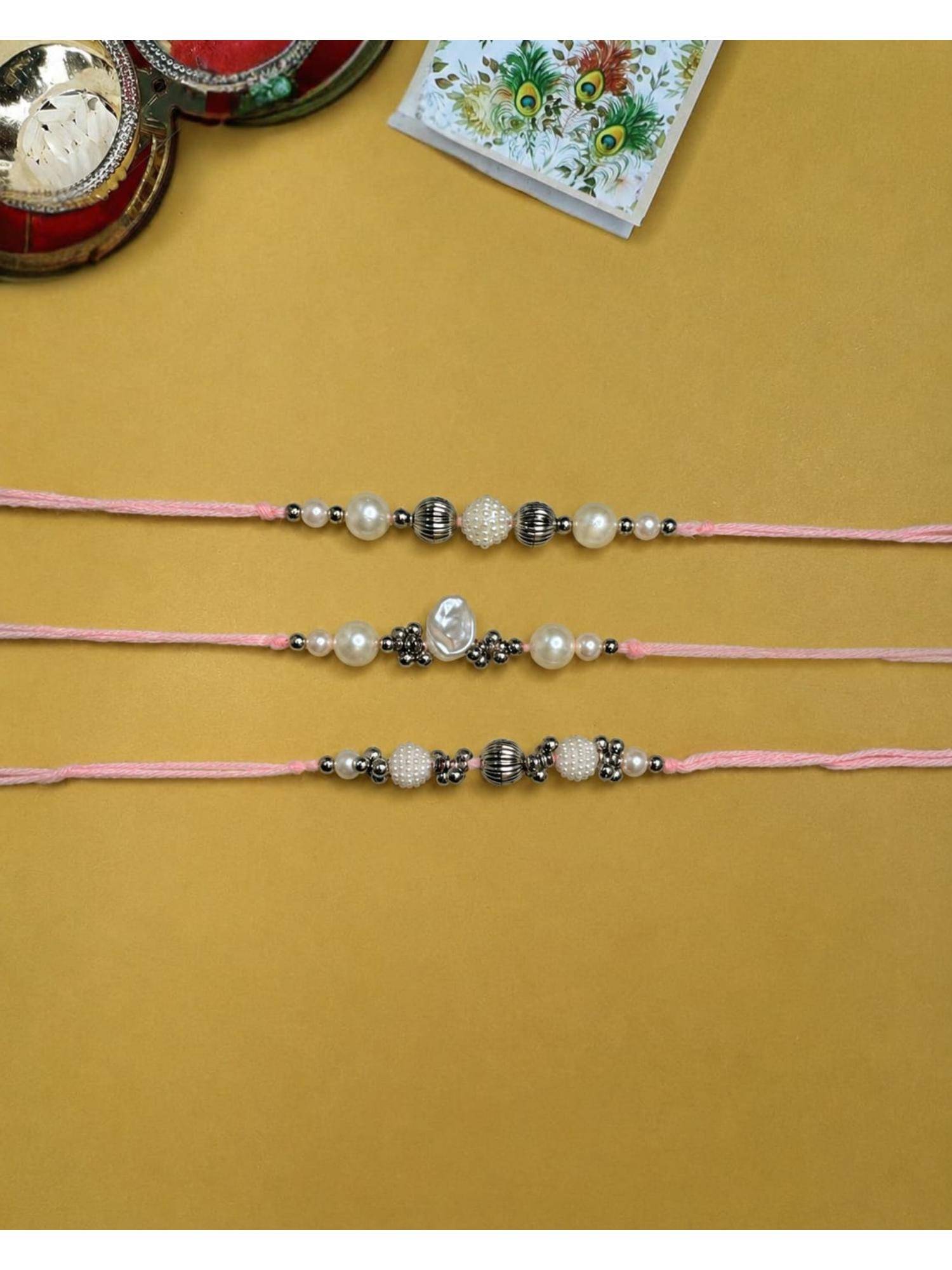 NVR White Pearls Thread Rakhis (Pack of 3)