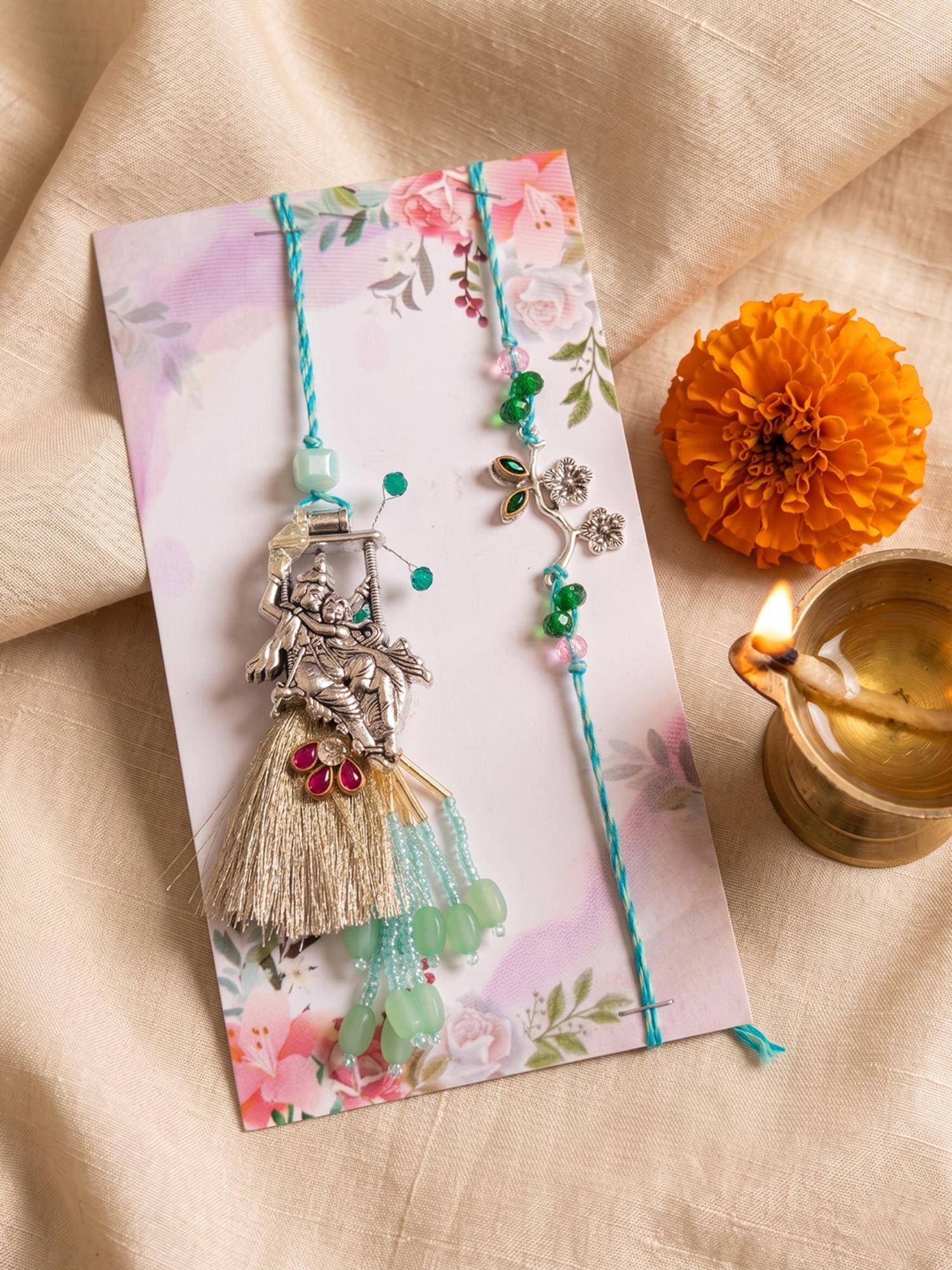 NVR Chandan Designer Religious Silver Toned Bhaiya Bhabhi Rakhis