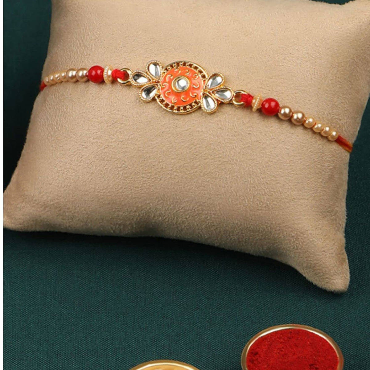 Accessher Delicate Orange Colour Enamel Rakhi with Roli, Rice & Card