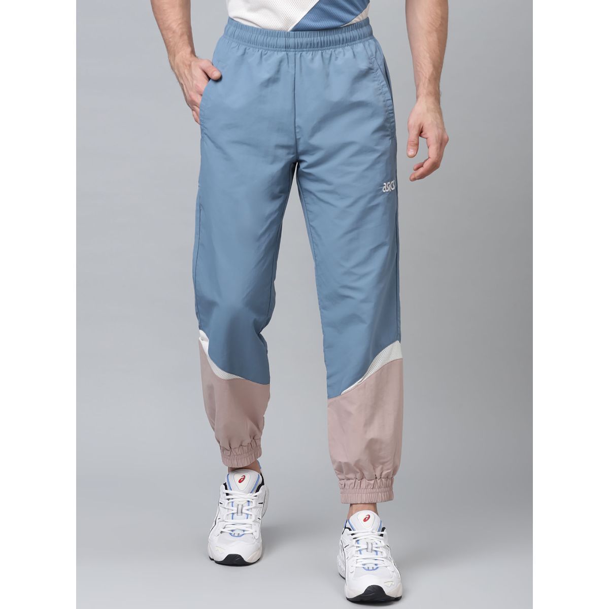 Buy Asics Woven Sports Moment Trackpants And Joggers Grey Online