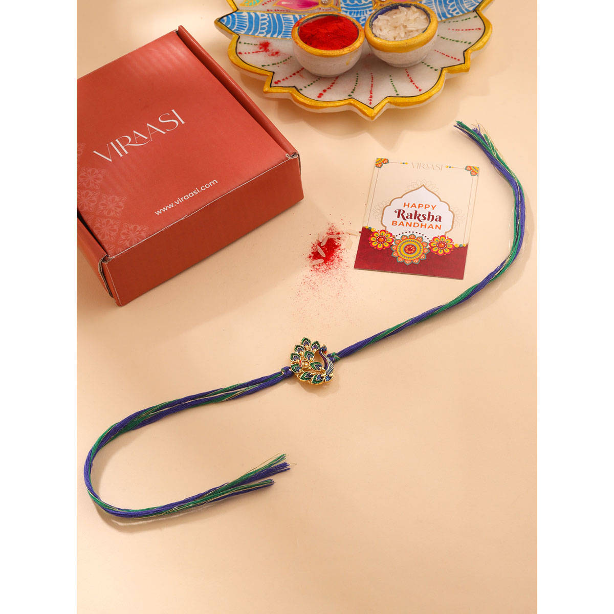 Viraasi Gold Plated Peacock Rakhi For Brother With Roli Chawal And Card