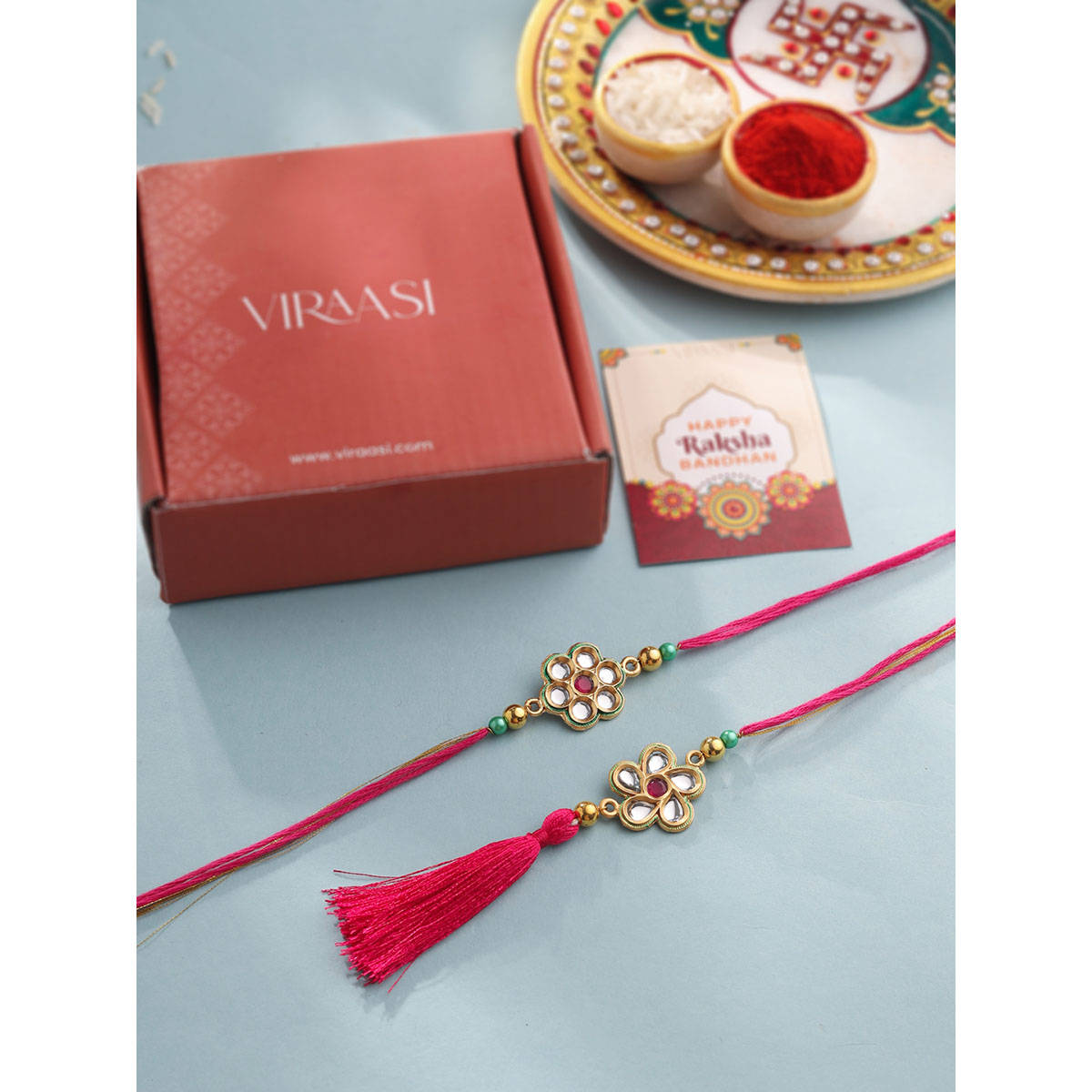 VIRAASI Bhaiya Bhabhi Rakhi Lumba Set with Perfume, Roli Chawal & Card