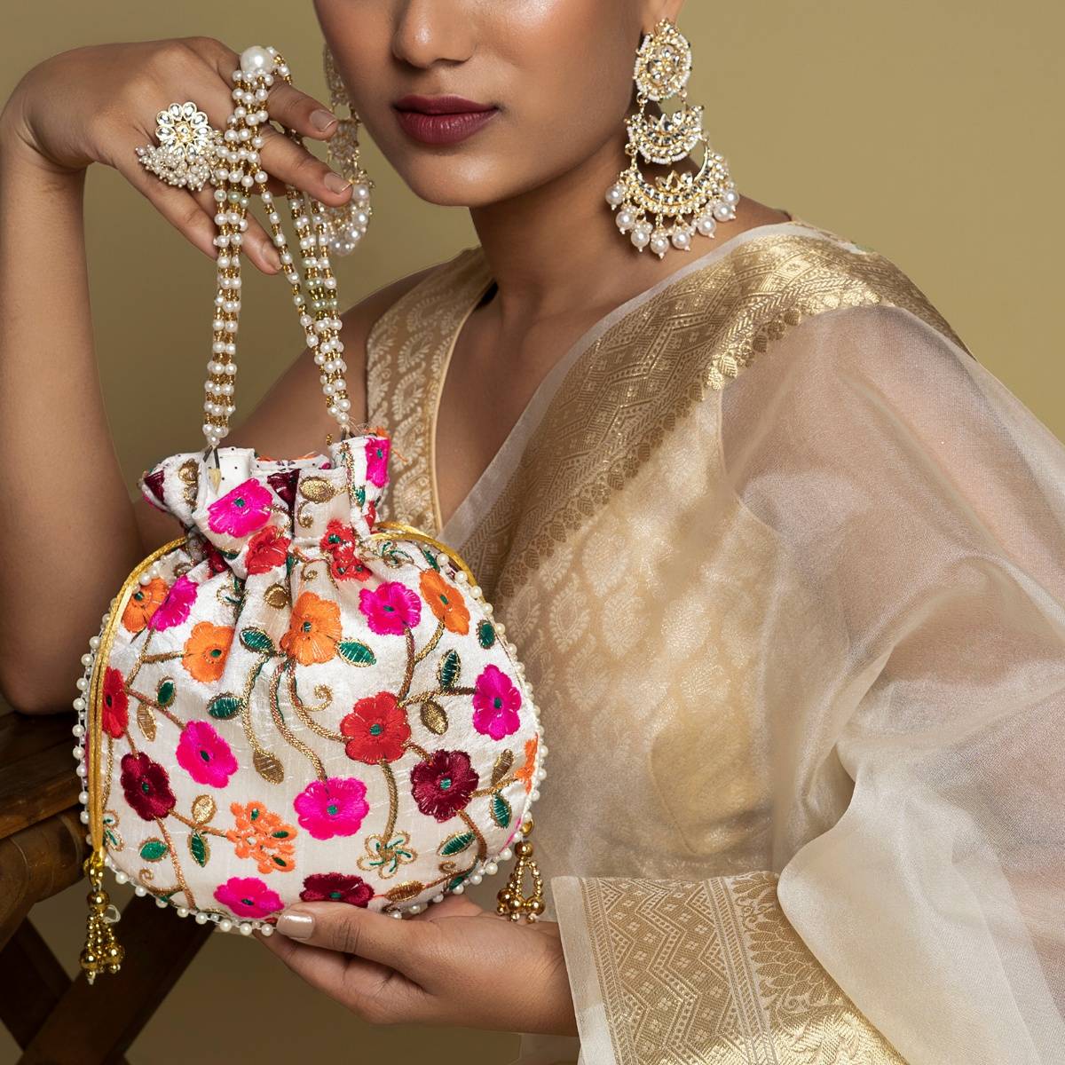 Teejh Glittering Garden Pink and Orange Embroidered Potli Bag