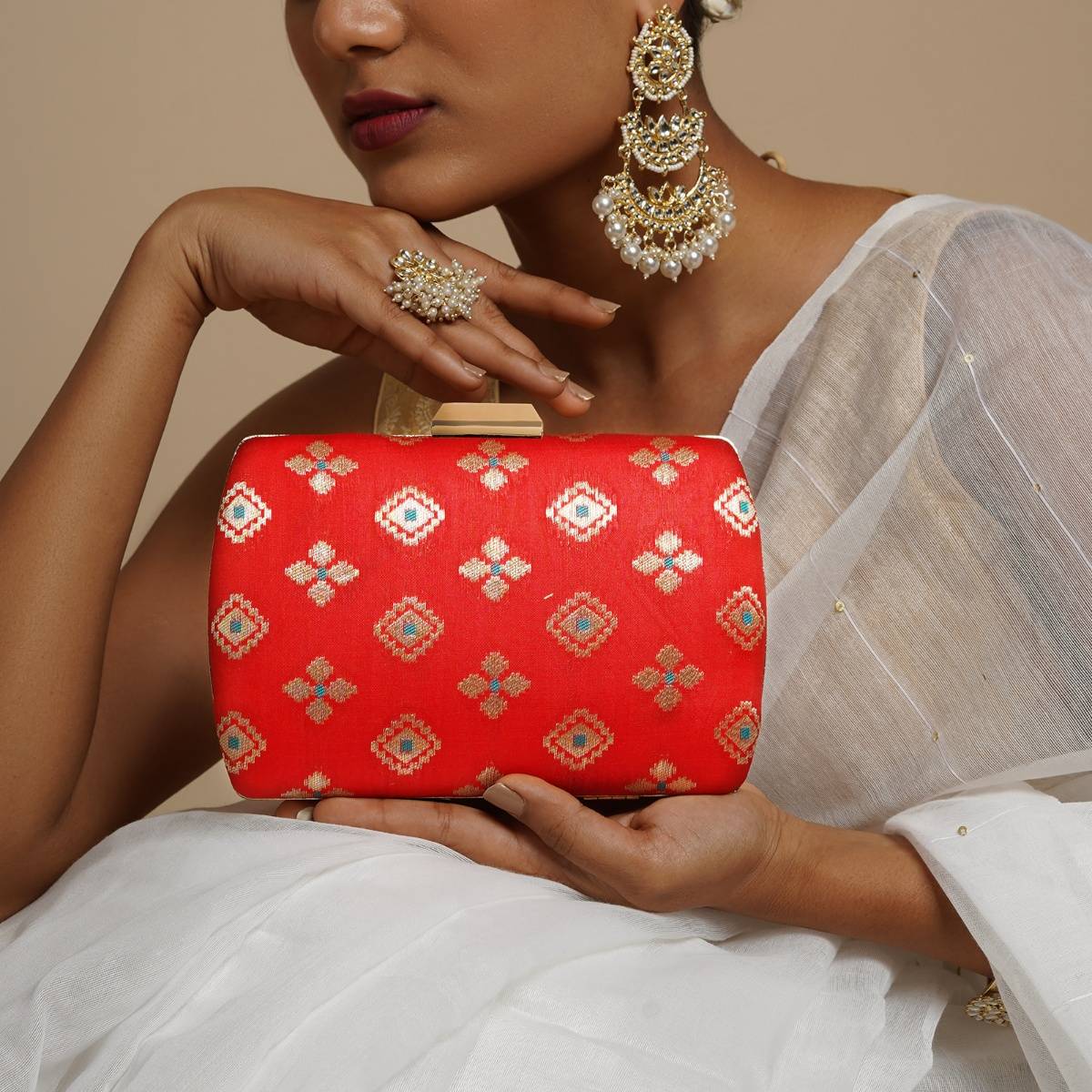Teejh Shaadi Saga Orange Brocade Fabric Clutch
