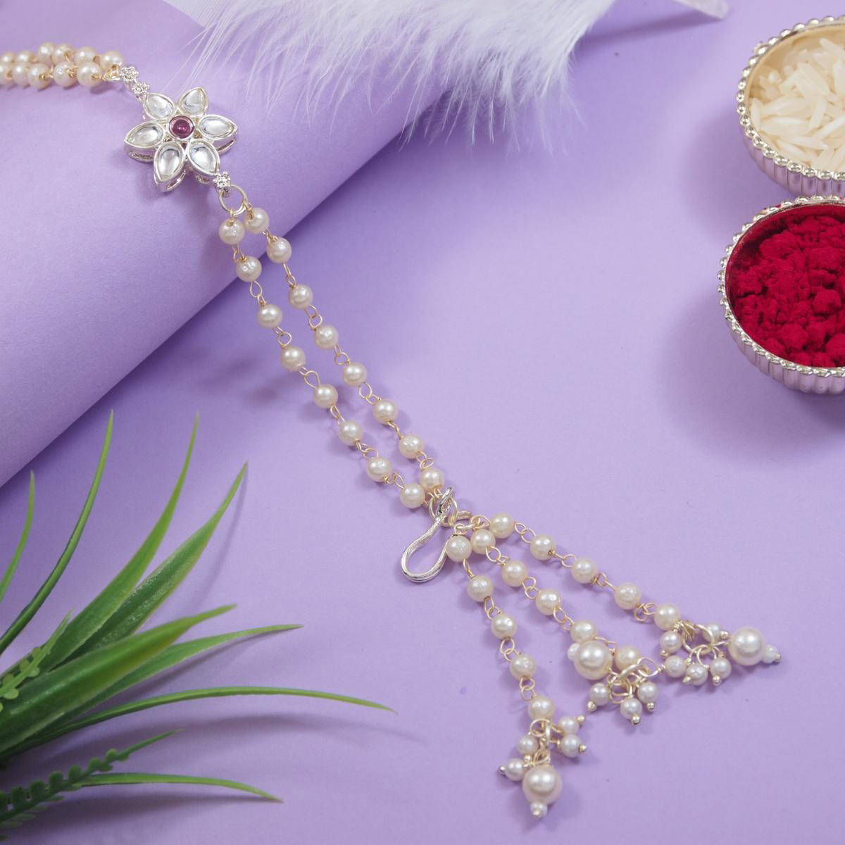 I Jewels Wine Floral Shaped Kundan & Pearl Bracelet Rakhi with Roli Chawal