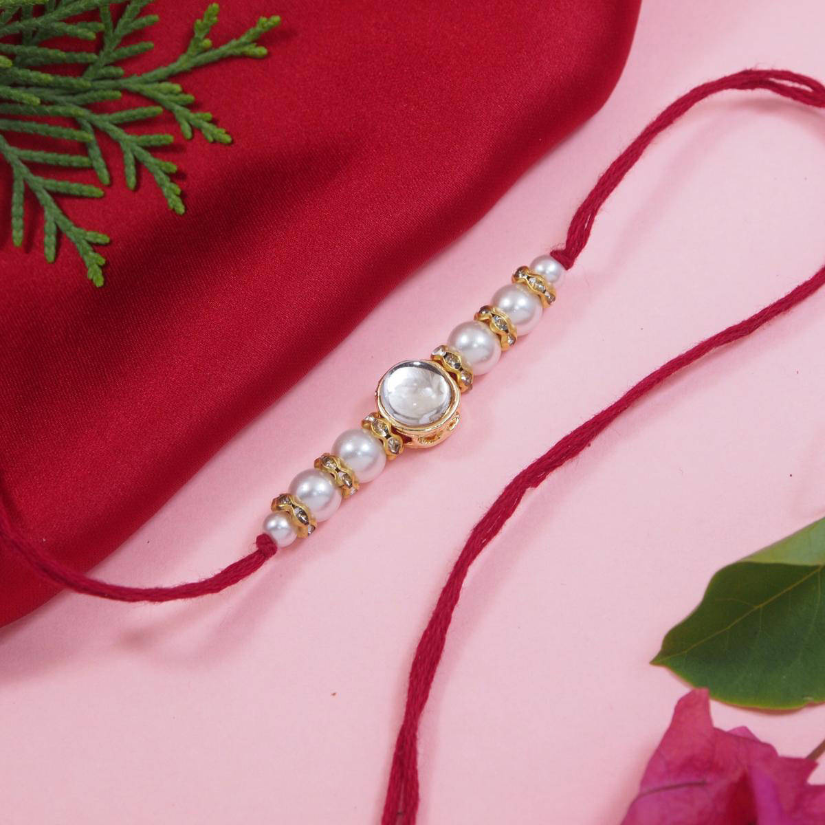 I Jewels Red Designer Kundan Pearl Rakhi with Roli Chawal & Rakshabandhan Card