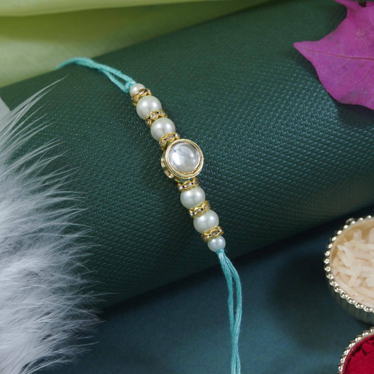 I Jewels Turquoise Designer Kundan Pearl Rakhi with Roli Chawal & Rakshabandhan Card
